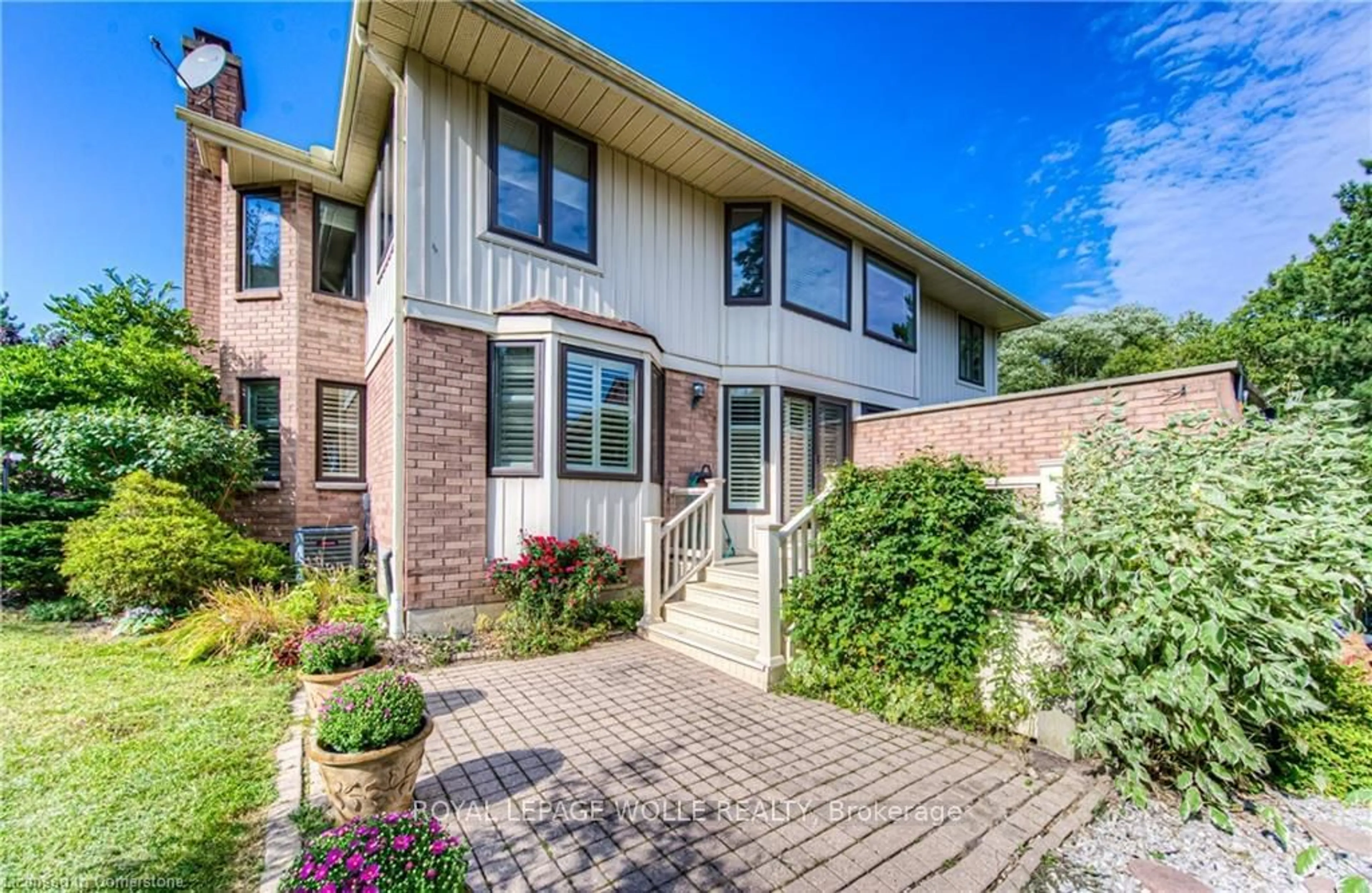 Home with brick exterior material, street for 410 Craigleith Dr #2, Waterloo Ontario N2L 5T2