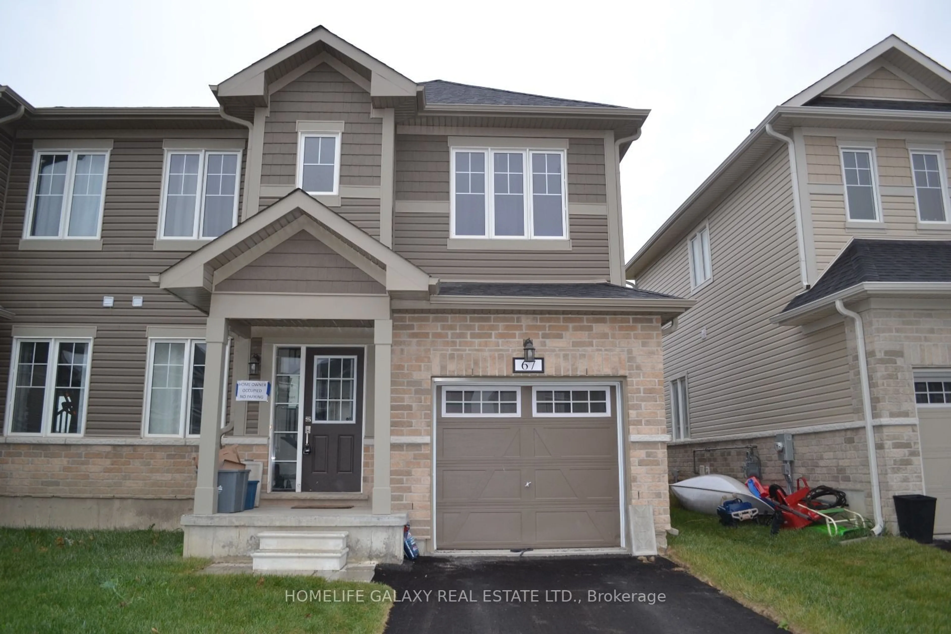 Home with vinyl exterior material, street for 67 Oakmont Dr, Loyalist Ontario K0H 1G0