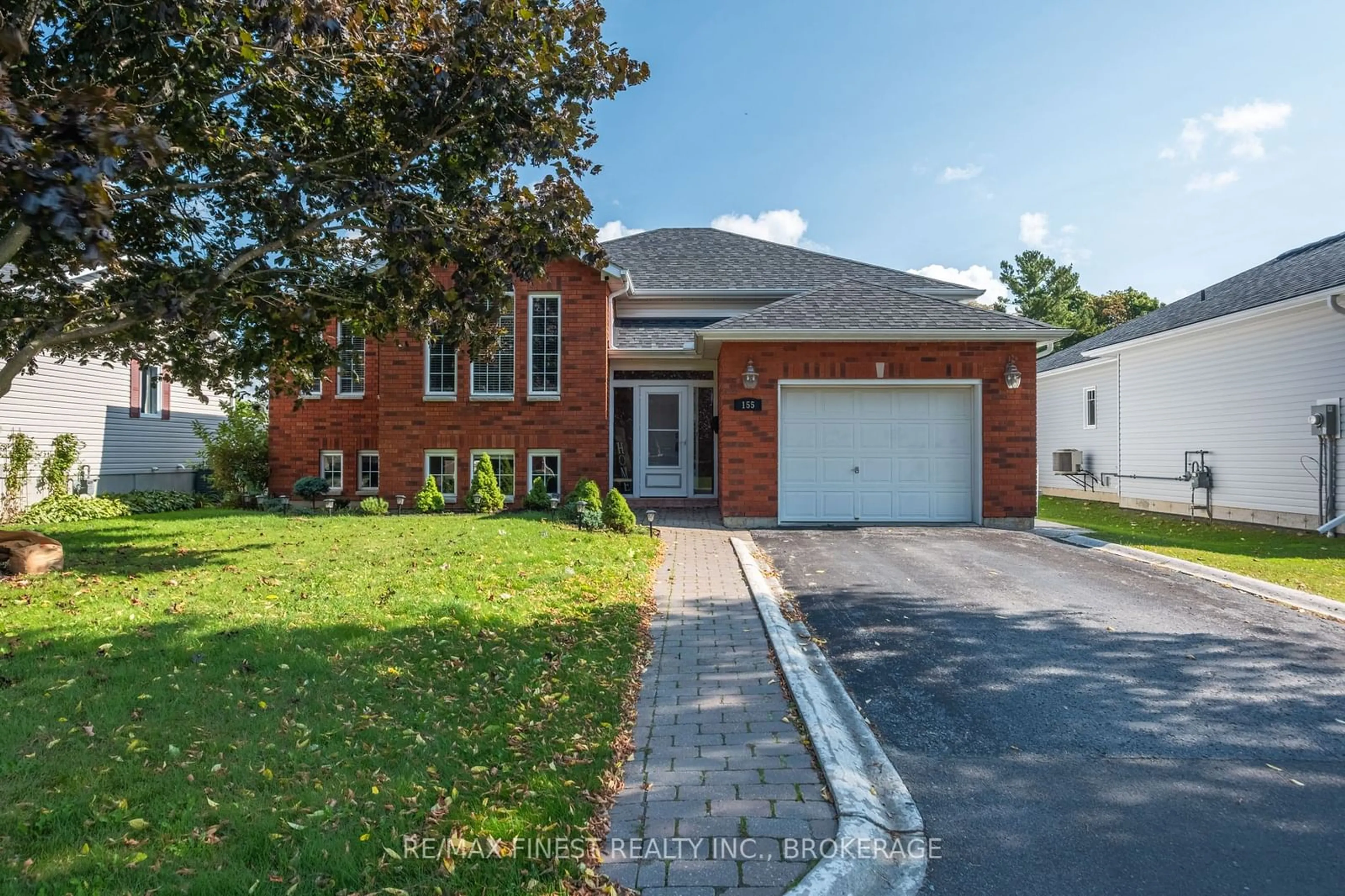 Home with brick exterior material, street for 155 ELMWOOD Dr, Gananoque Ontario K7G 1P2