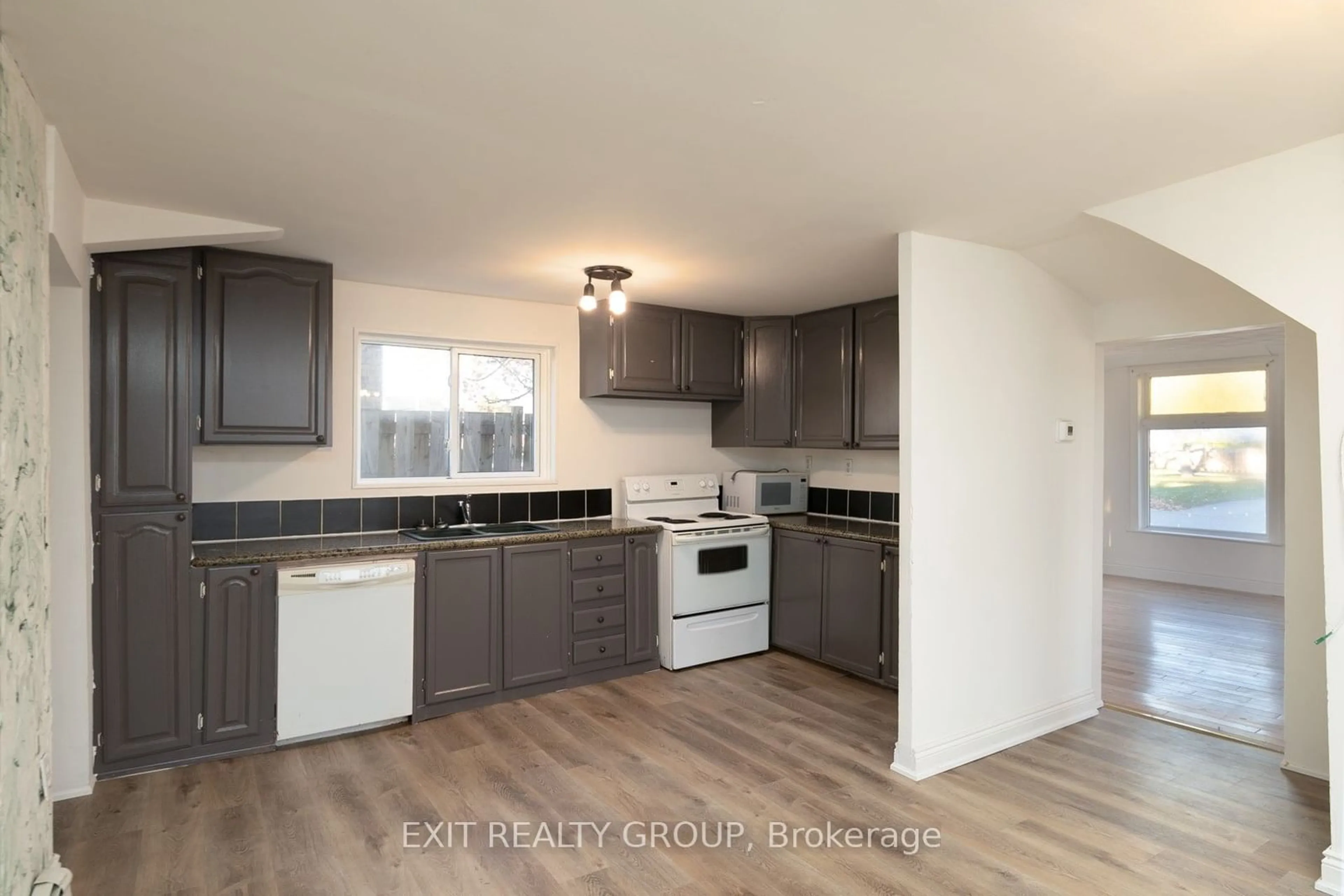 Open concept kitchen, wood/laminate floor for 56 South John St, Belleville Ontario K8N 3E3