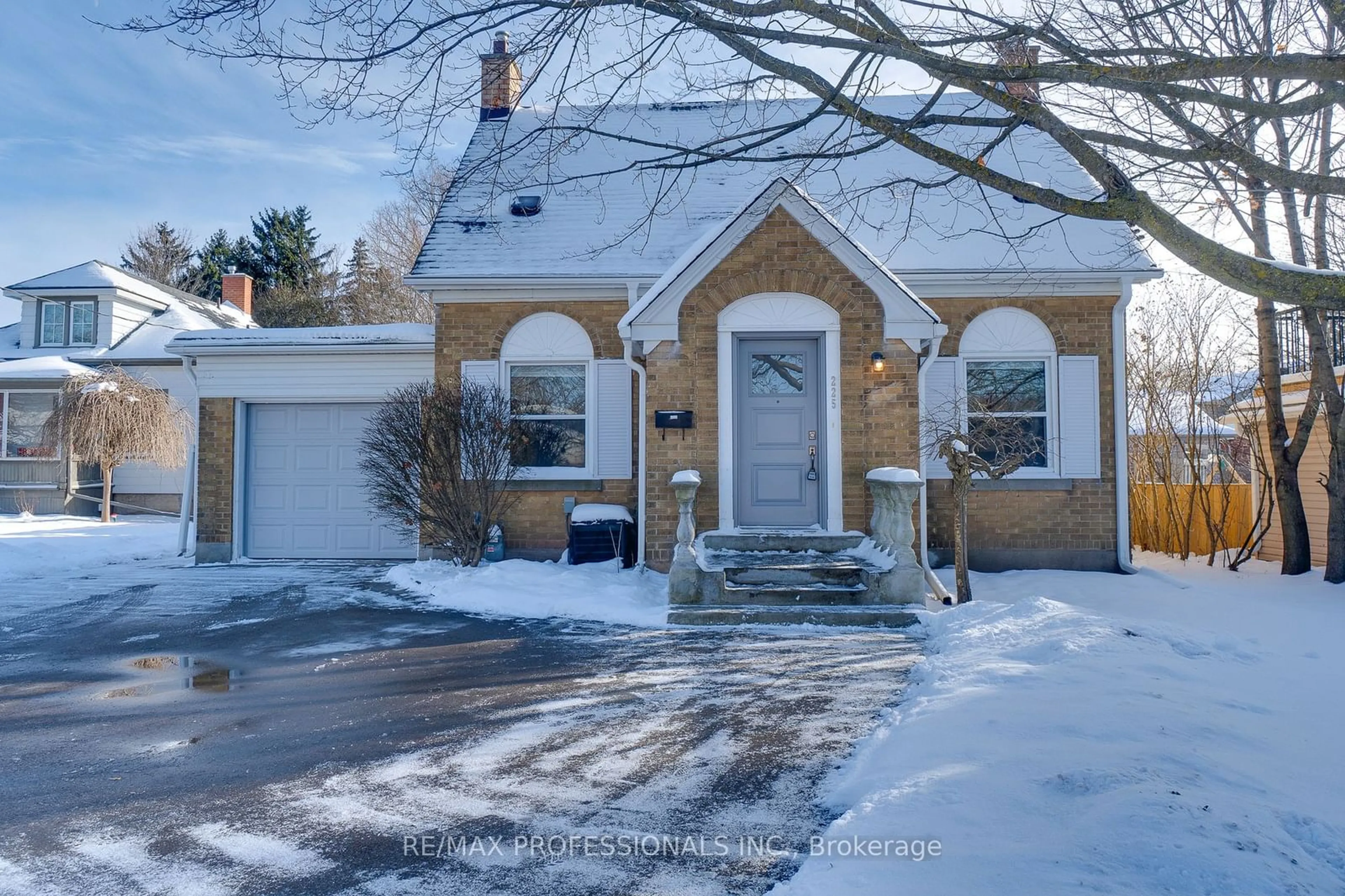 Home with brick exterior material, street for 225 Bridgeport Rd, Waterloo Ontario N2J 2K7