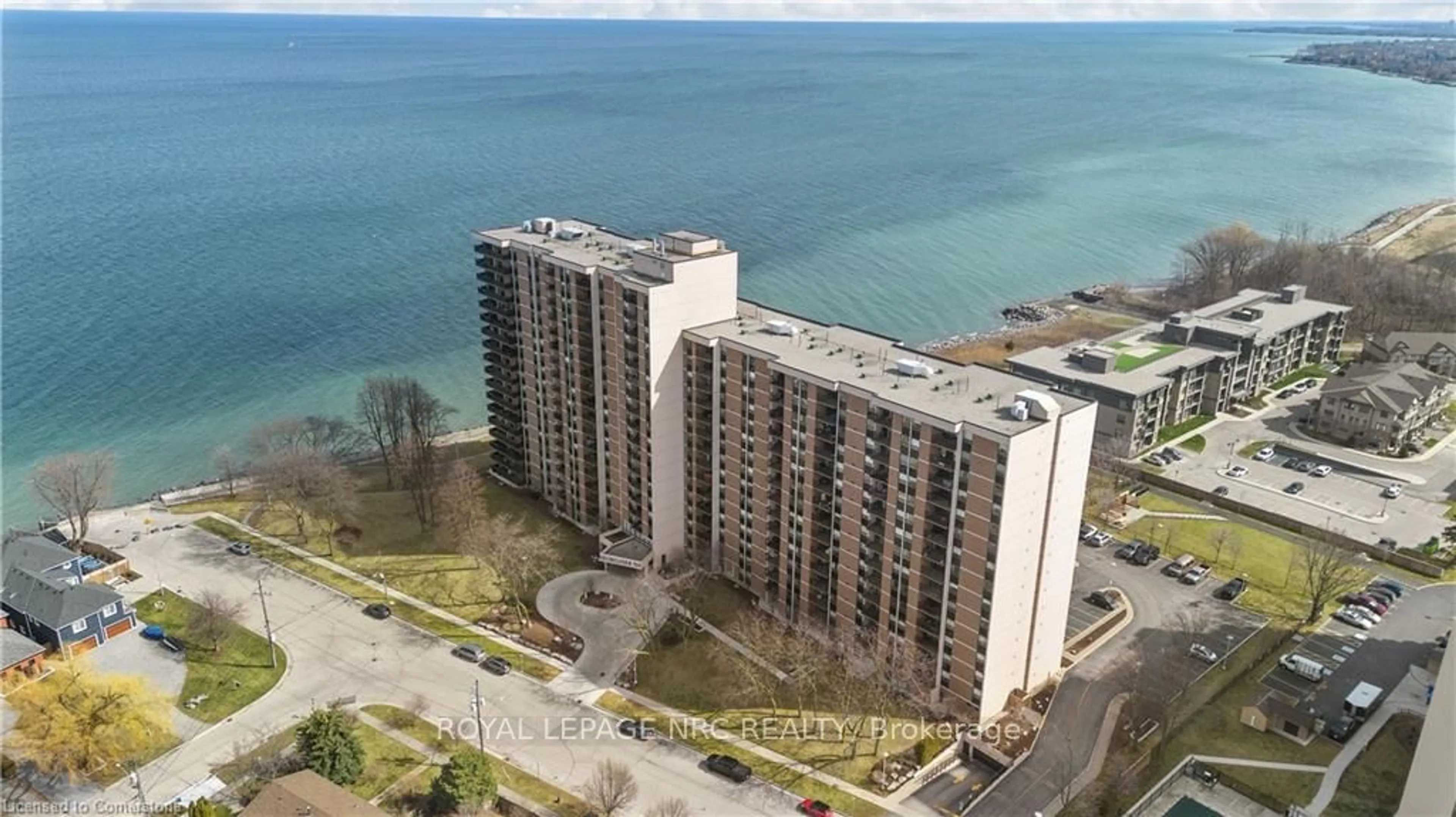 A pic from outside/outdoor area/front of a property/back of a property/a pic from drone, water/lake/river/ocean view for 500 GREEN Rd #1414, Hamilton Ontario L8E 3M6