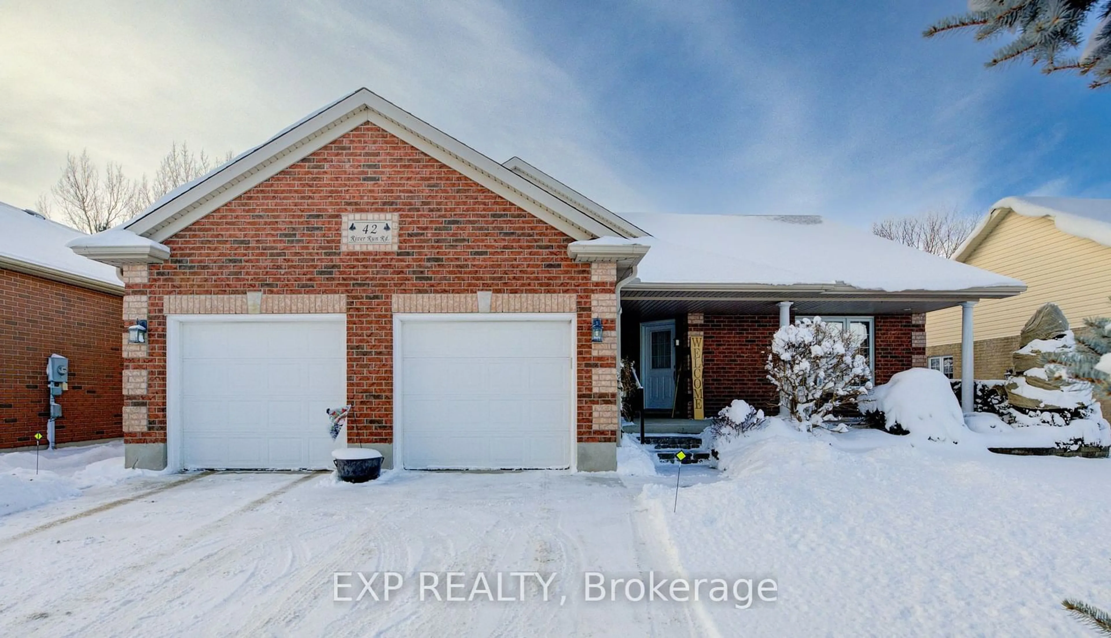 Home with brick exterior material, street for 42 River Run Rd, Mapleton Ontario N0G 1P0