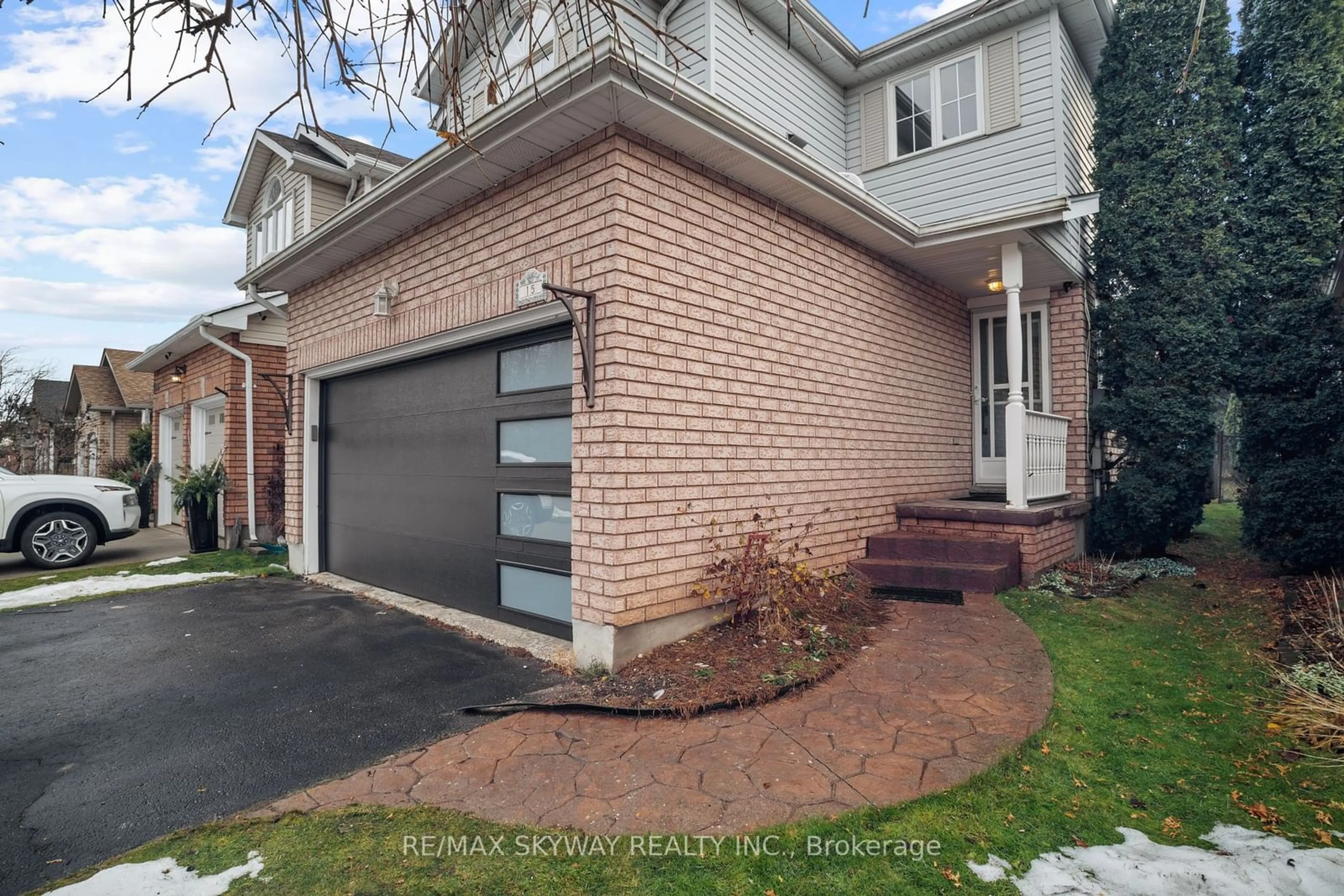 Home with brick exterior material, street for 15 Briarfield St, Kitchener Ontario N2A 4B6