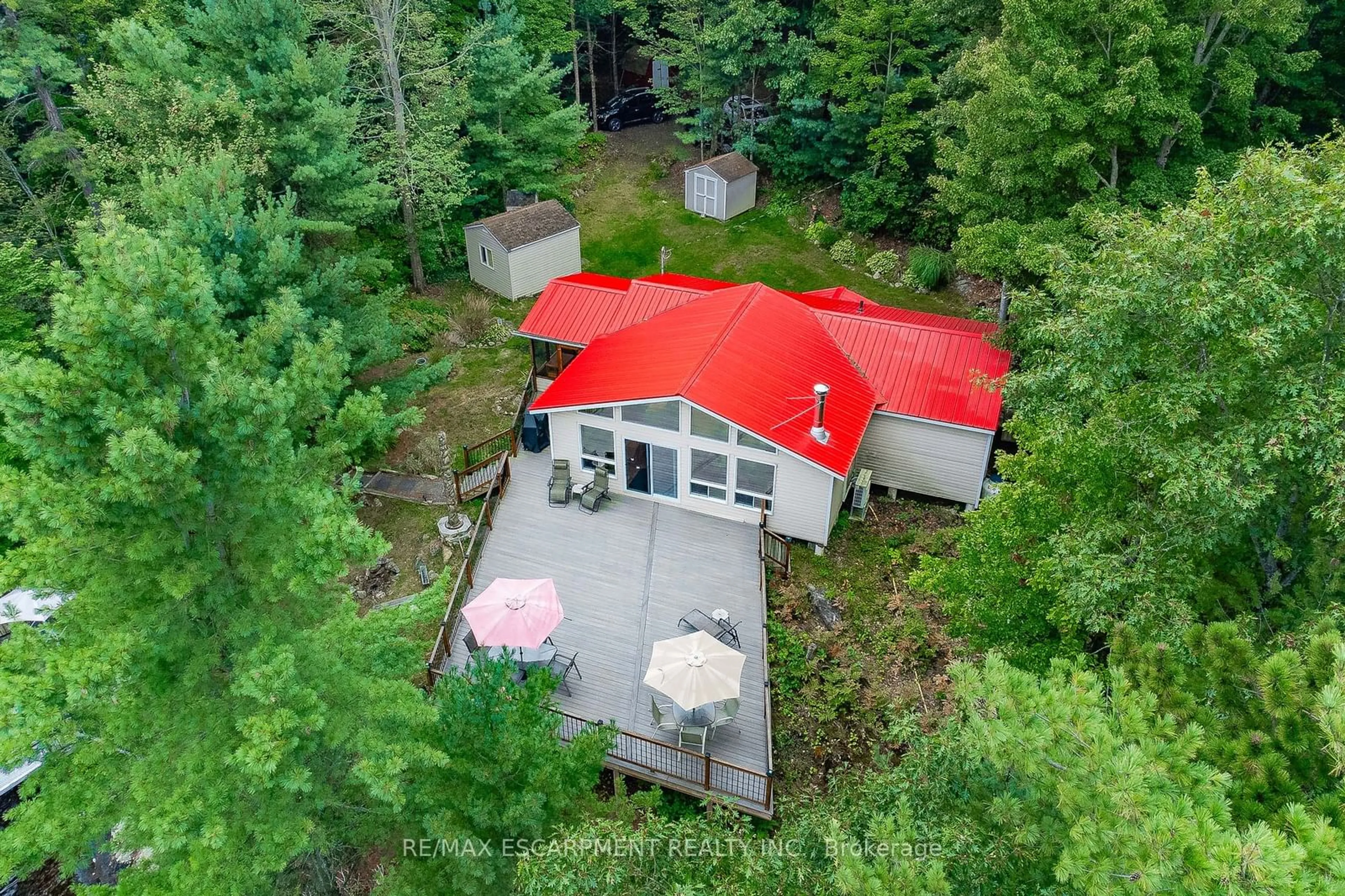 A pic from outside/outdoor area/front of a property/back of a property/a pic from drone, forest/trees view for 1076 Thanksgiving Rock Way, Gravenhurst Ontario L0K 2B0