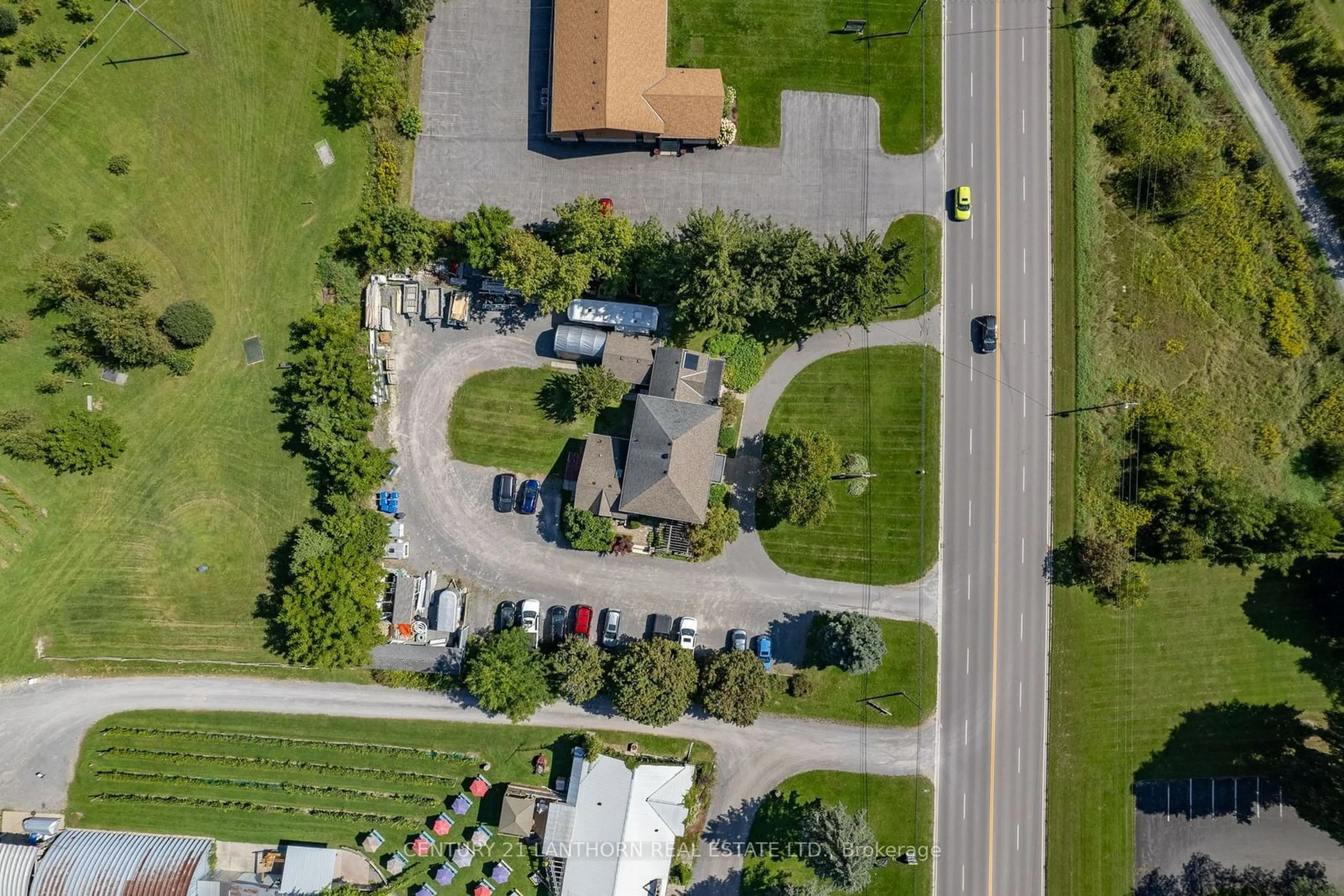 A pic from outside/outdoor area/front of a property/back of a property/a pic from drone, street for 13360 Loyalist Pkwy, Prince Edward County Ontario K0K 2T0