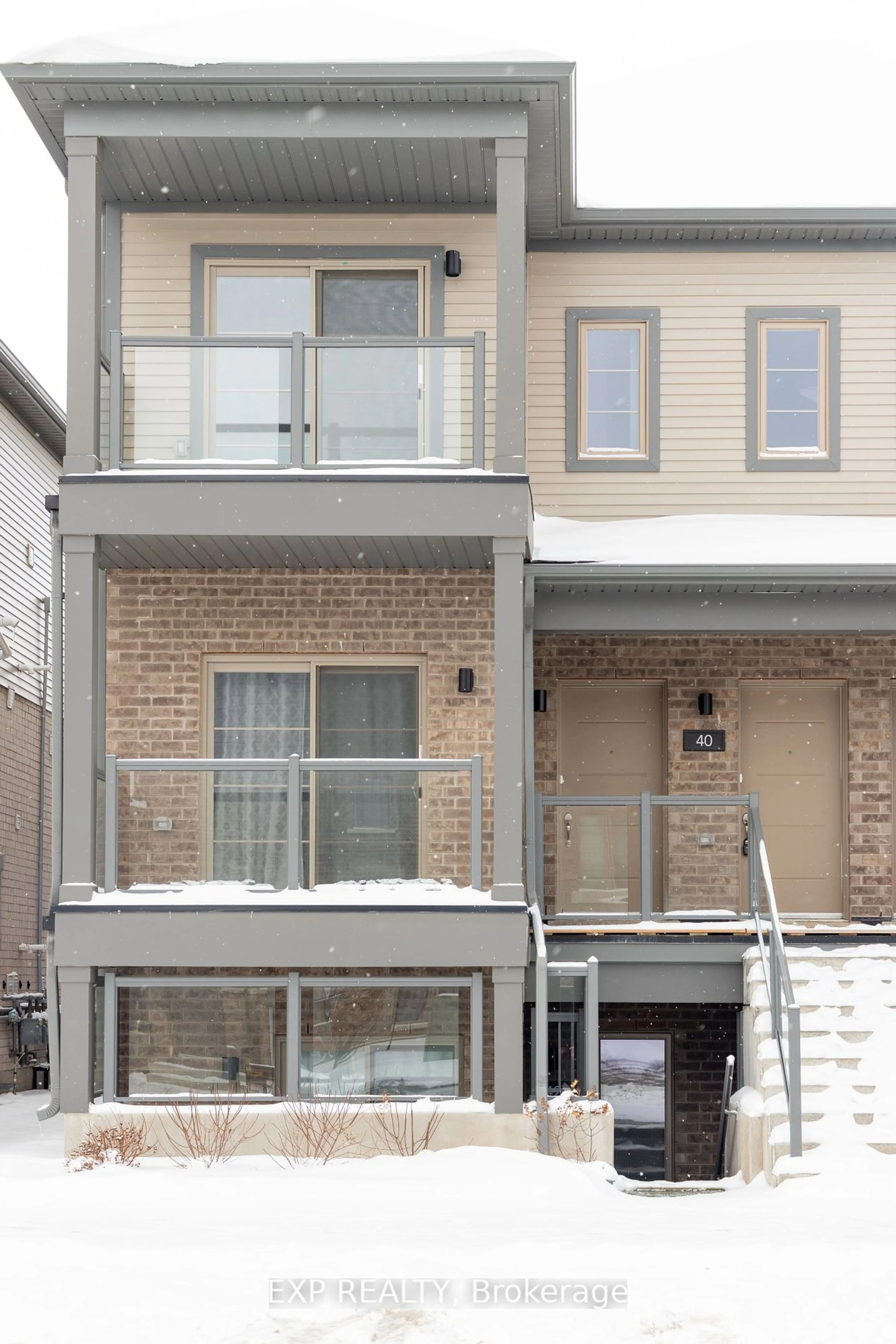 Home with brick exterior material, street for 205 West Oak Tr #40, Kitchener Ontario N2R 0R9