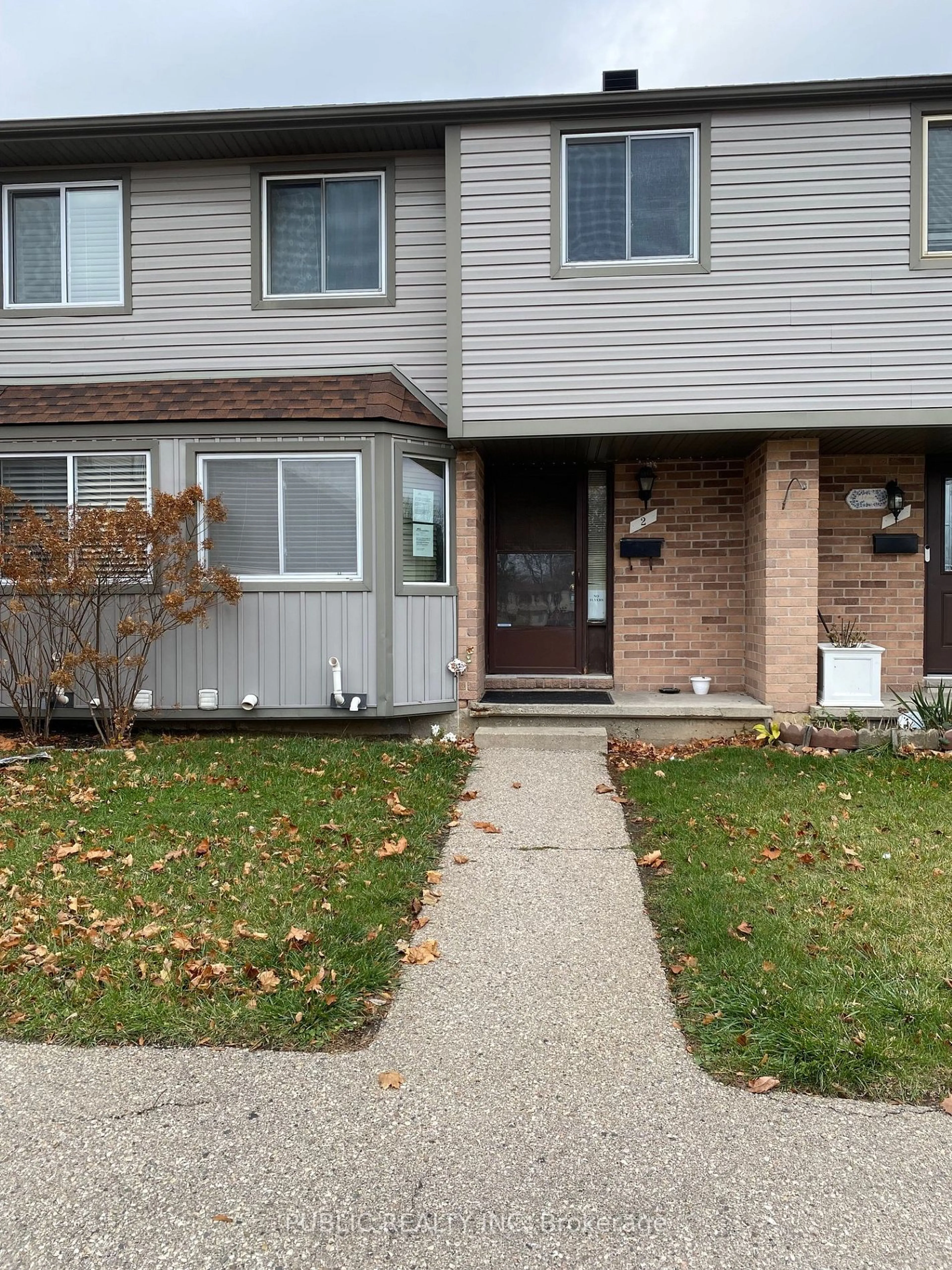 Home with vinyl exterior material, street for 700 Erinbrook Dr #2, Kitchener Ontario N2E 2S7