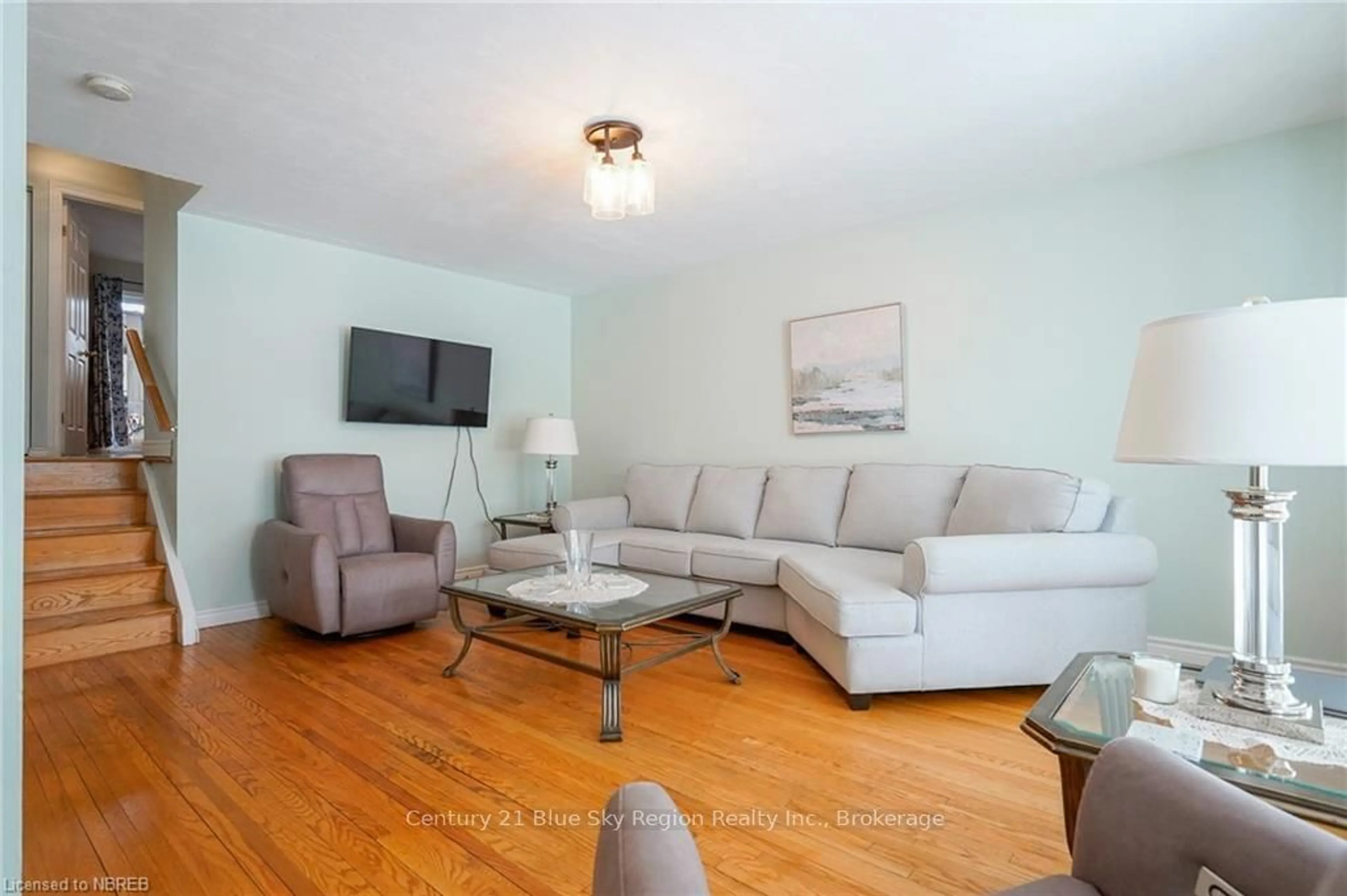 Living room with furniture, wood/laminate floor for 14 MARSHALL PARK Dr, North Bay Ontario P1A 2N9