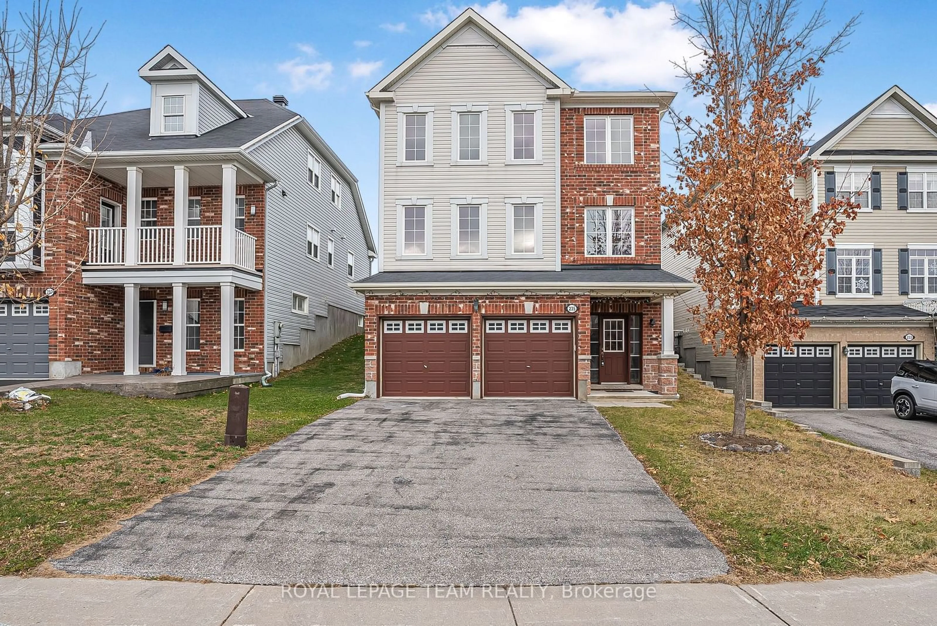 Home with brick exterior material, street for 235 HUNTSVILLE Dr, Kanata Ontario K2T 0C7