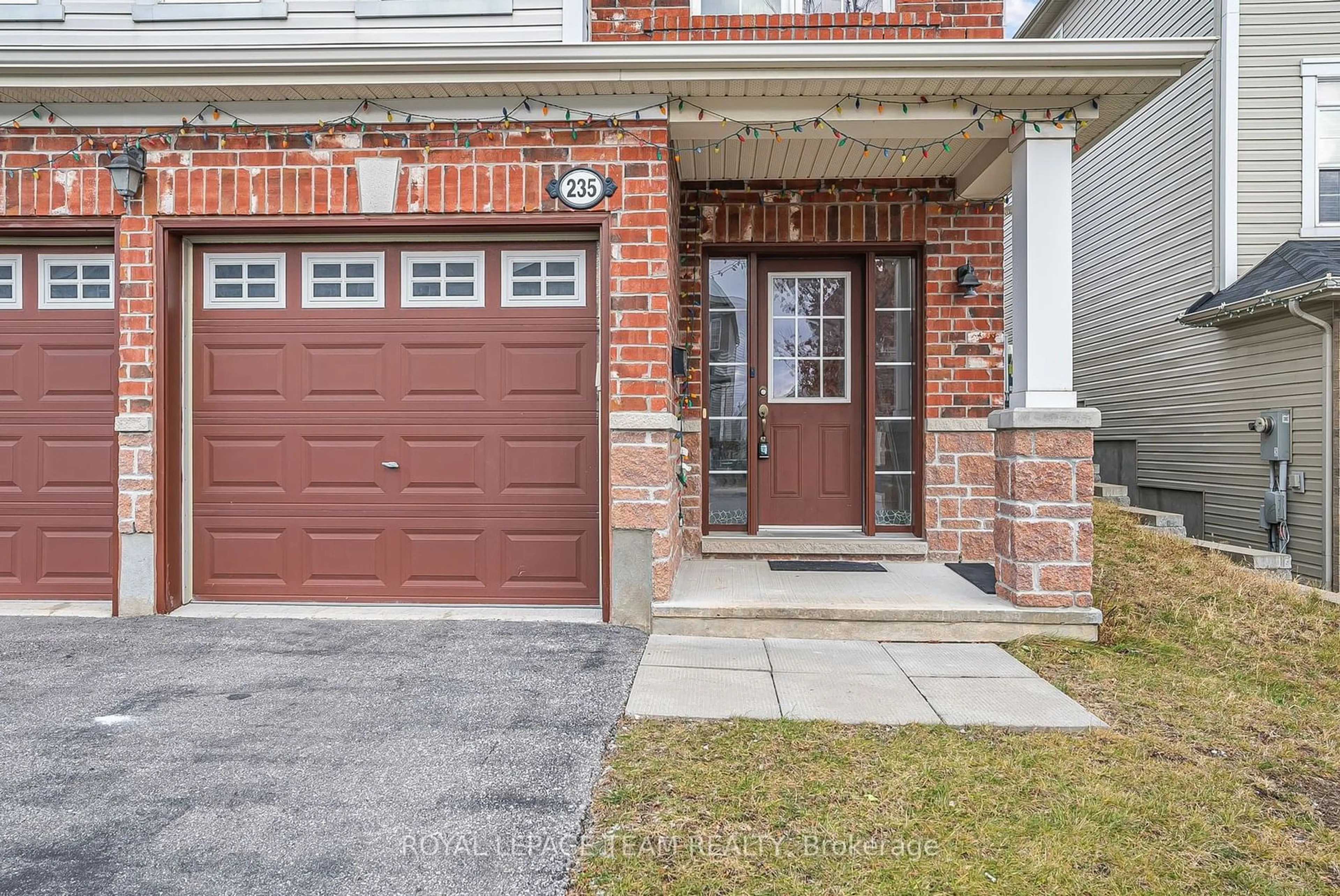 Home with brick exterior material, street for 235 HUNTSVILLE Dr, Kanata Ontario K2T 0C7