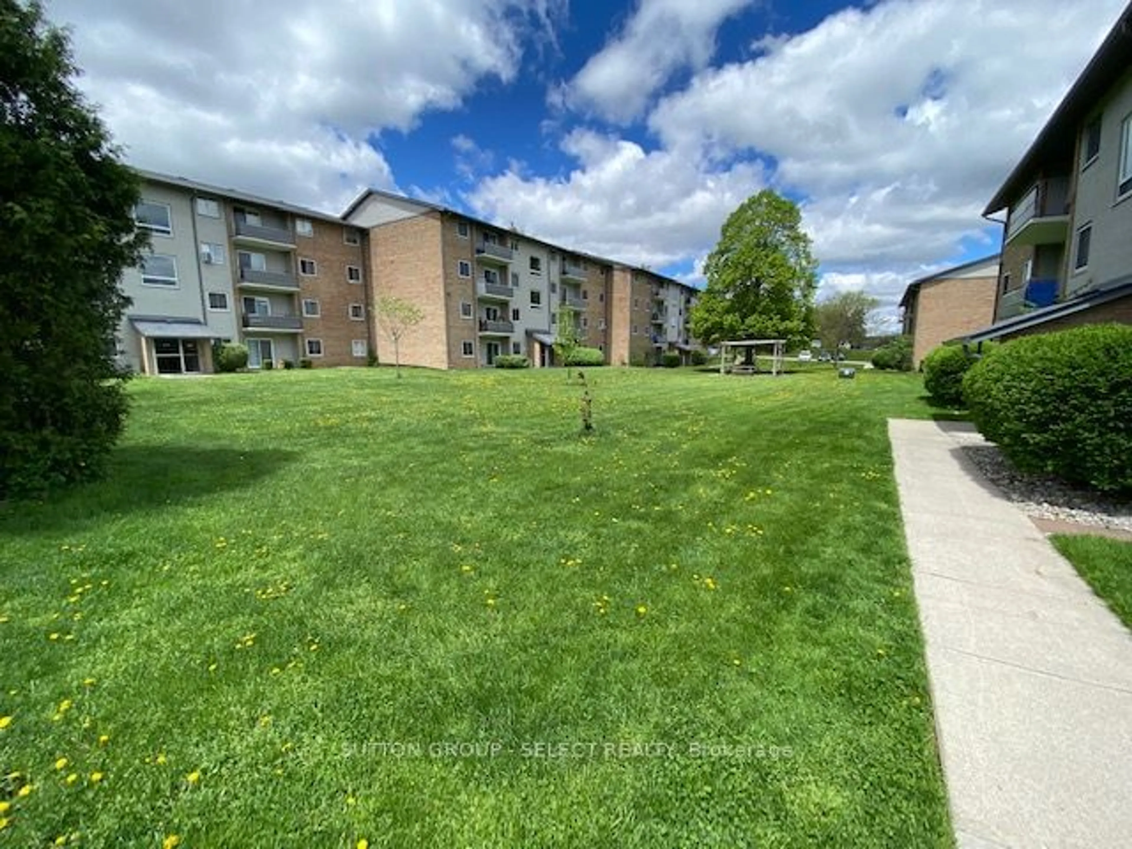 A pic from outside/outdoor area/front of a property/back of a property/a pic from drone, unknown for 625 Wonderland Rd #11, London Ontario N6K 1M1