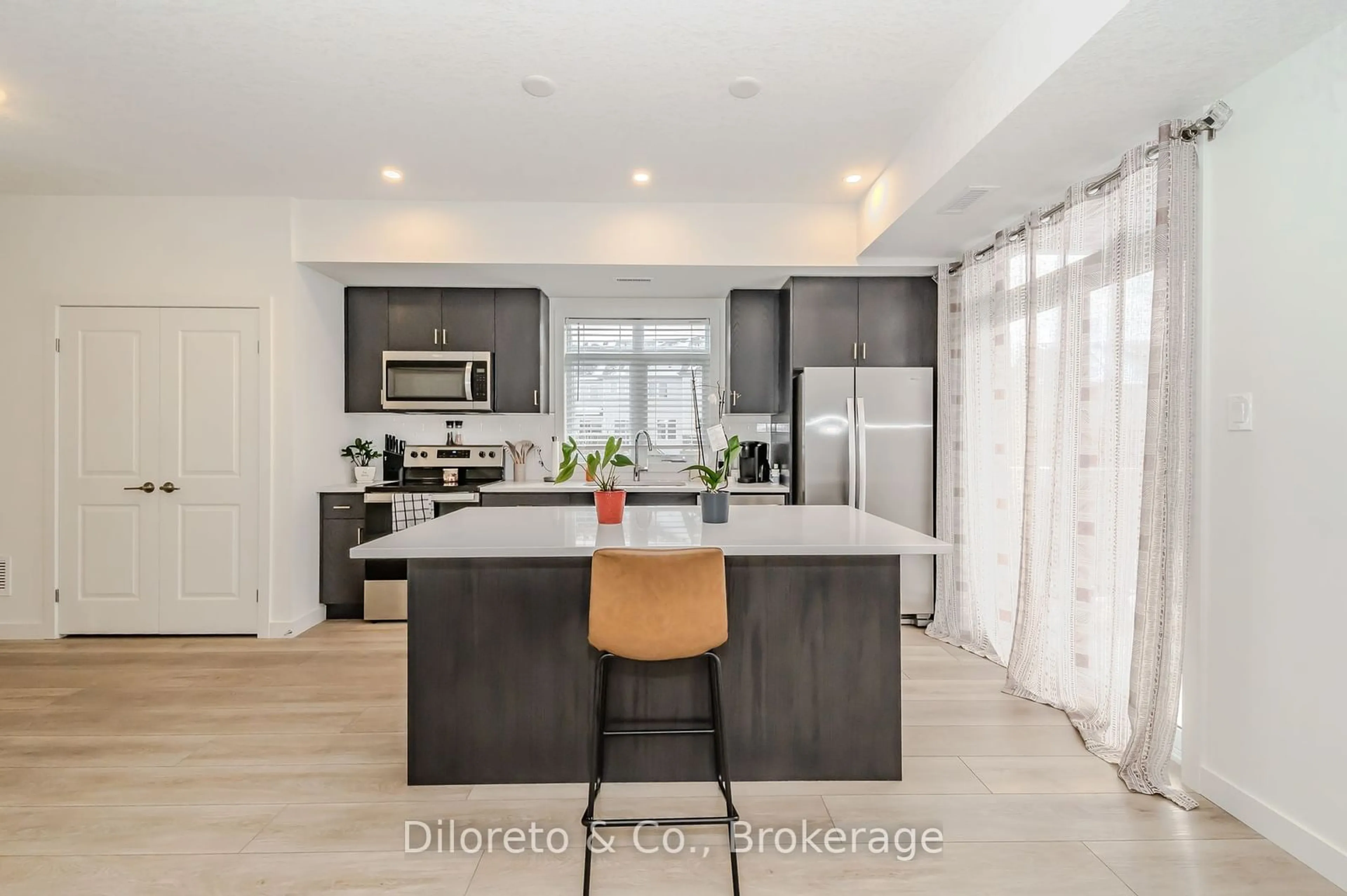 Open concept kitchen, ceramic/tile floor for 405 Myers Rd #50, Cambridge Ontario N1R 6X7