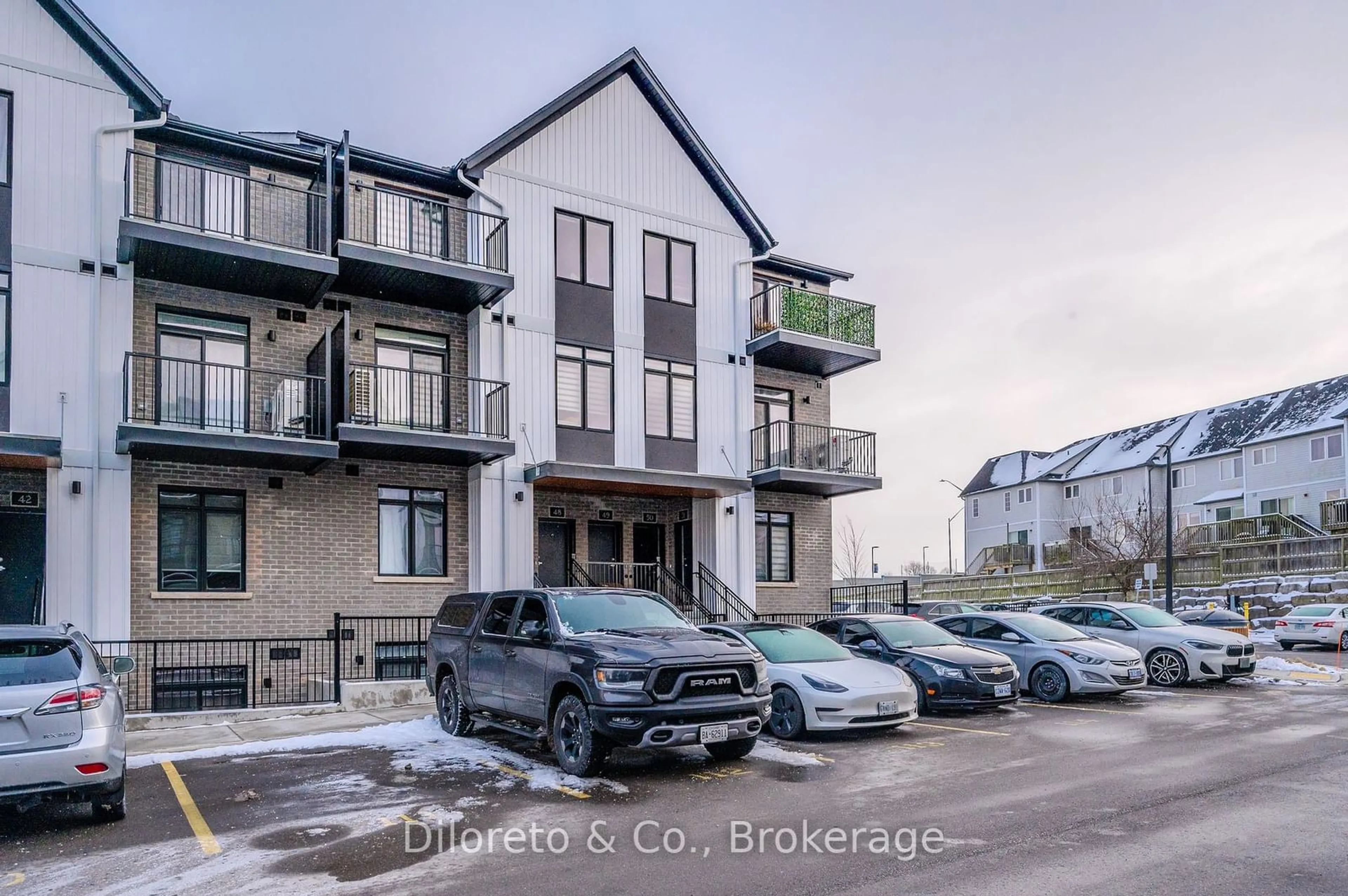 A pic from outside/outdoor area/front of a property/back of a property/a pic from drone, street for 405 Myers Rd #50, Cambridge Ontario N1R 6X7