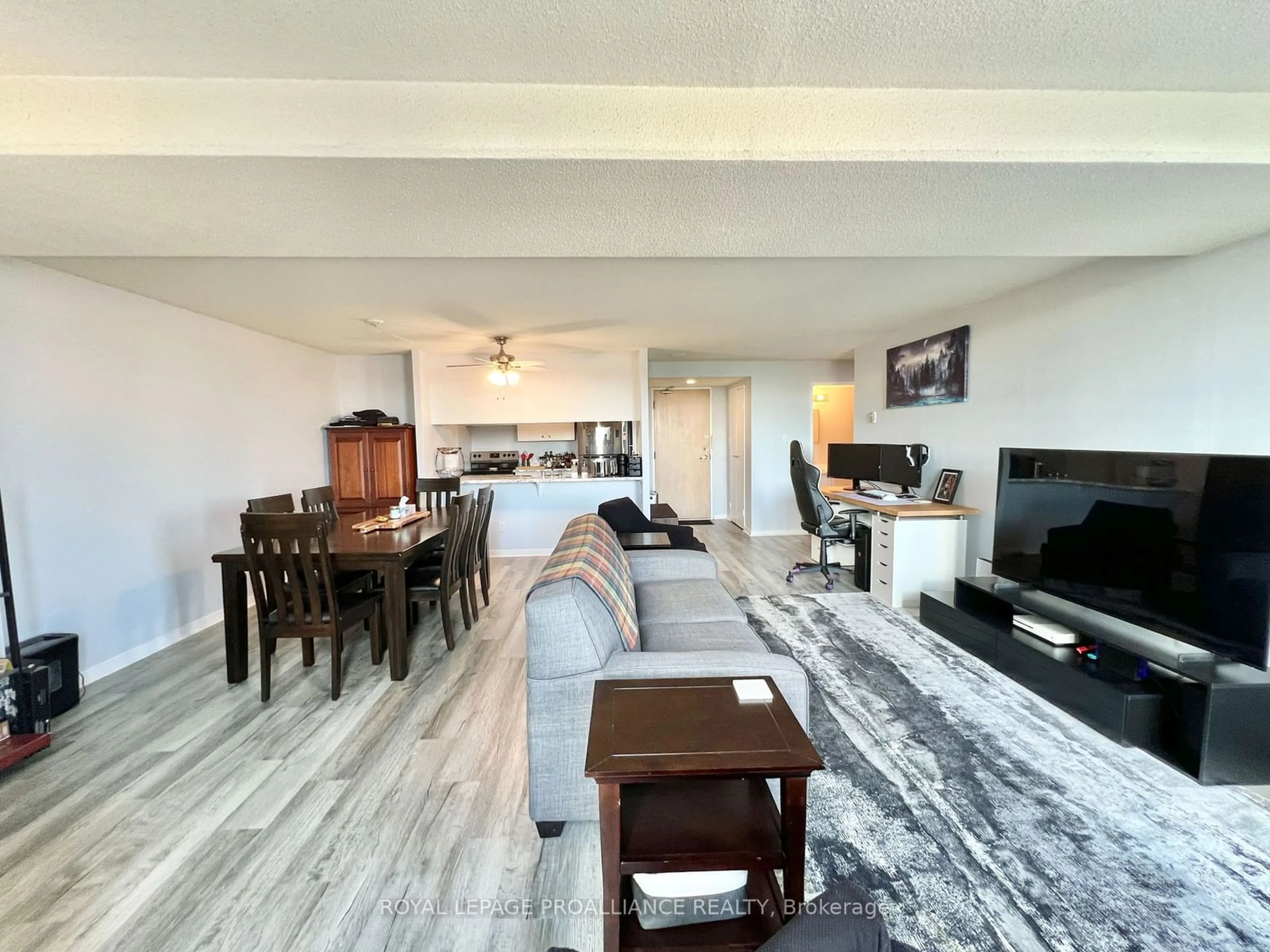 Living room with furniture, wood/laminate floor for 350 Front St #406, Belleville Ontario K8N 5M5