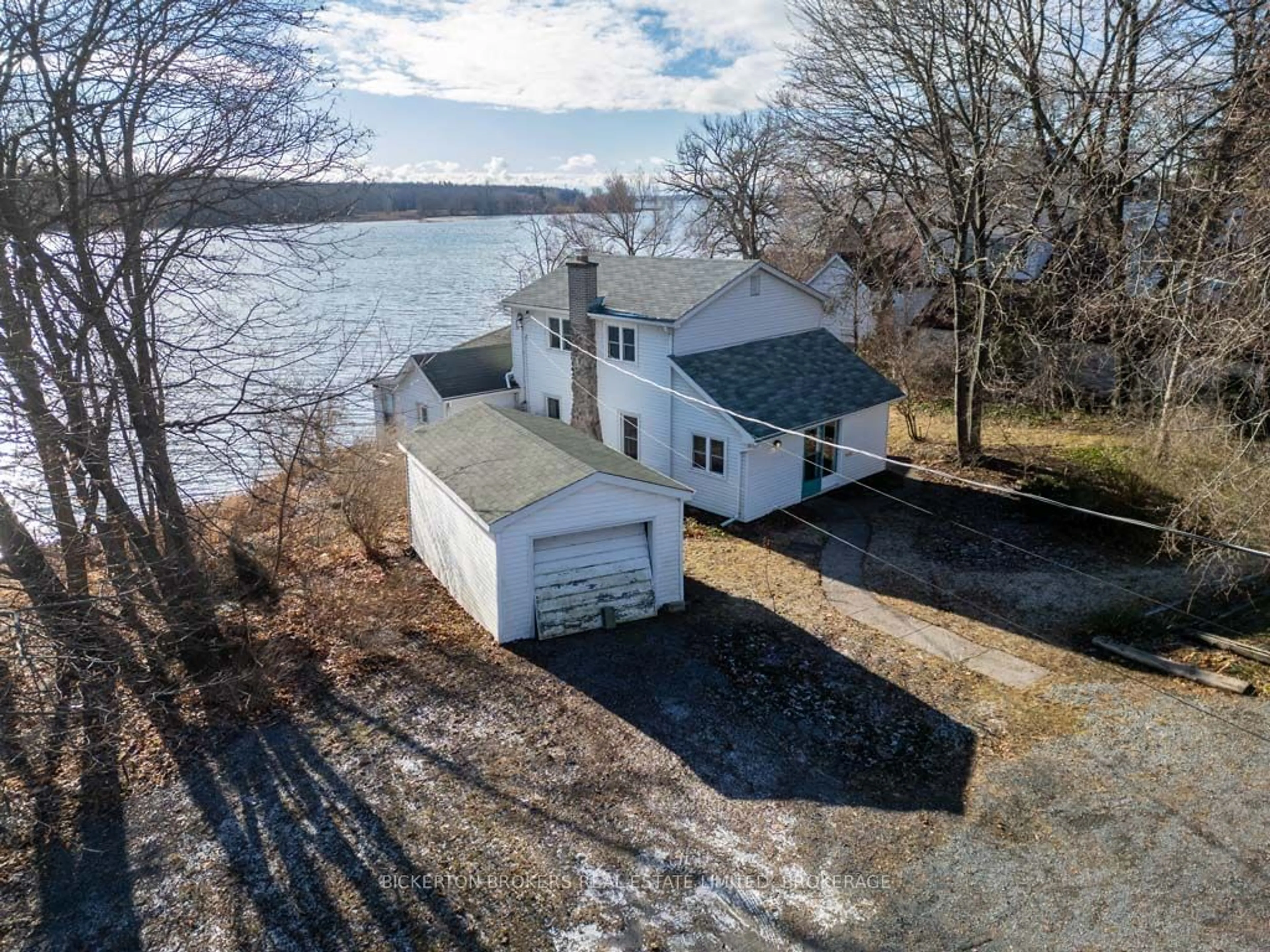 A pic from outside/outdoor area/front of a property/back of a property/a pic from drone, water/lake/river/ocean view for 4056 Bath Rd, Kingston Ontario K7M 4Y4