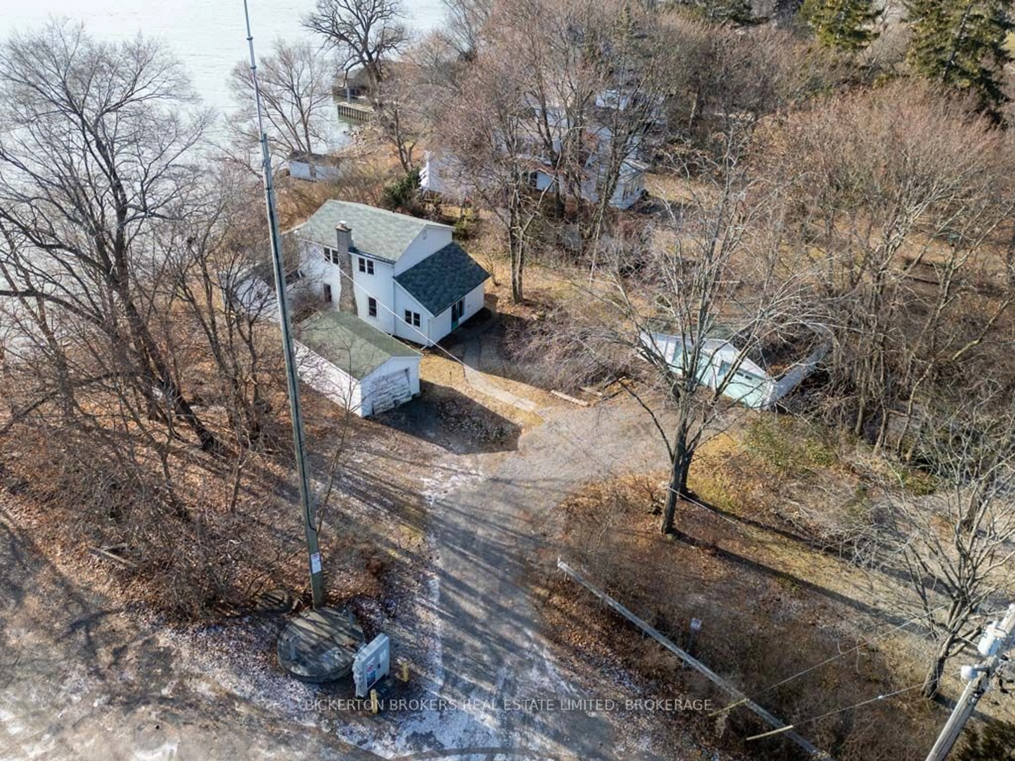 A pic from outside/outdoor area/front of a property/back of a property/a pic from drone, water/lake/river/ocean view for 4056 Bath Rd, Kingston Ontario K7M 4Y4