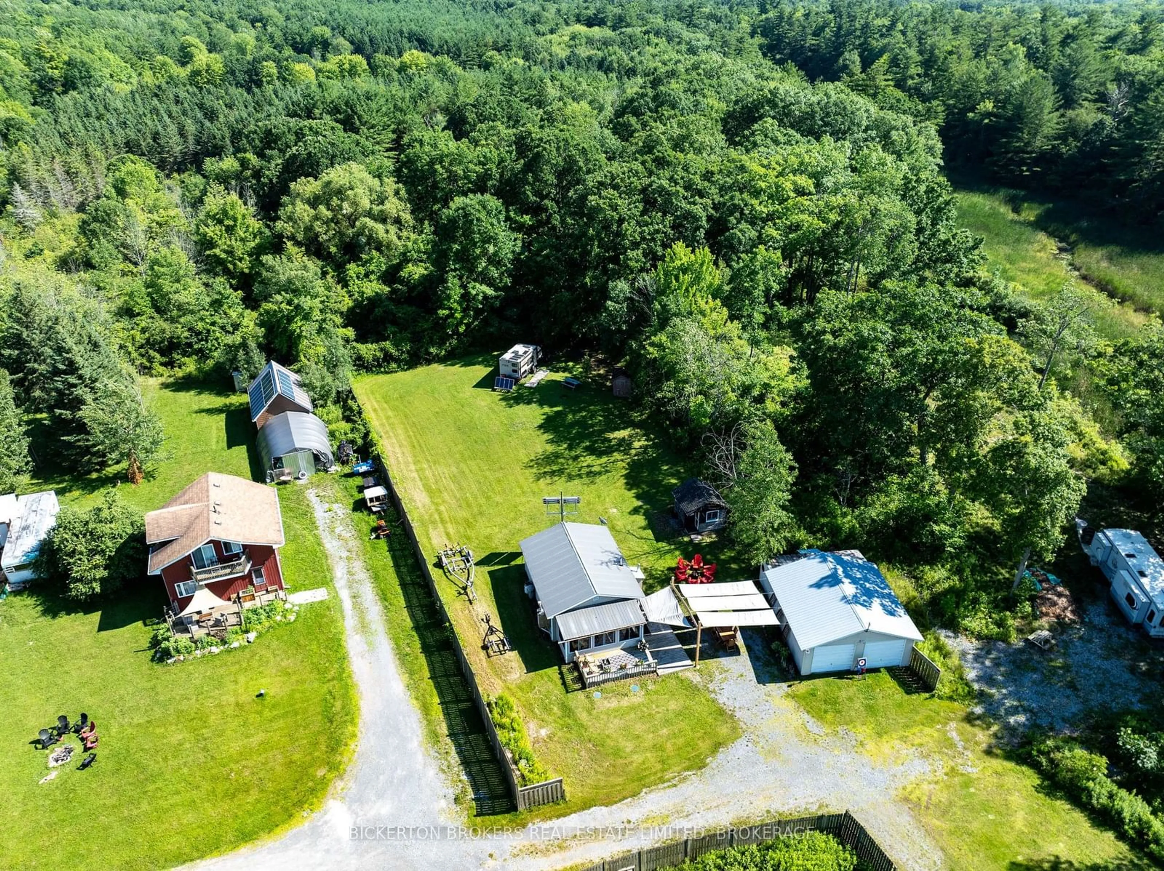 A pic from outside/outdoor area/front of a property/back of a property/a pic from drone, unknown for 356 Driscoll Rd #C, Frontenac Islands Ontario K7G 2V6