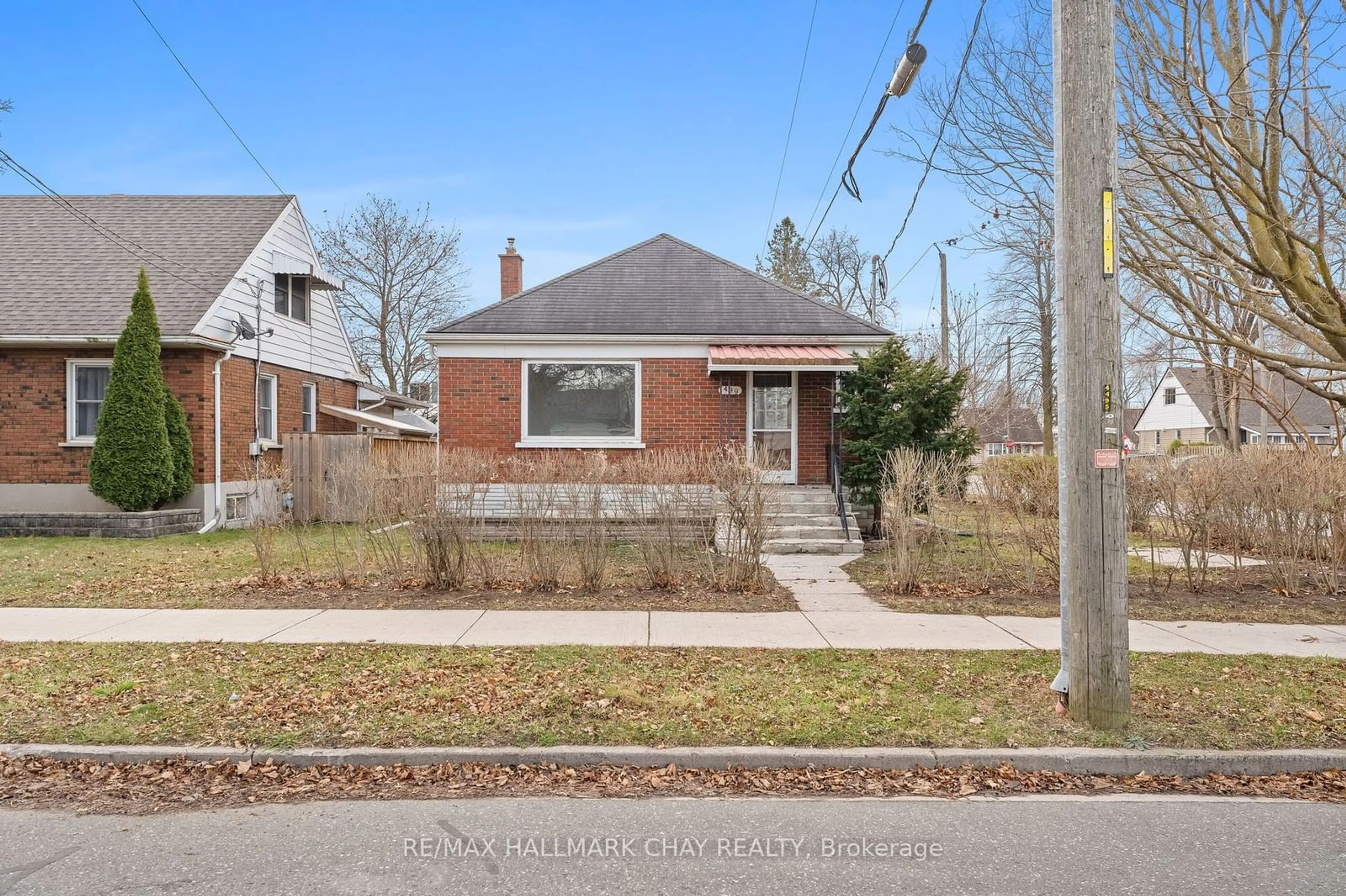 Home with brick exterior material, street for 499 Braidwood Ave, Peterborough Ontario K9J 1V7