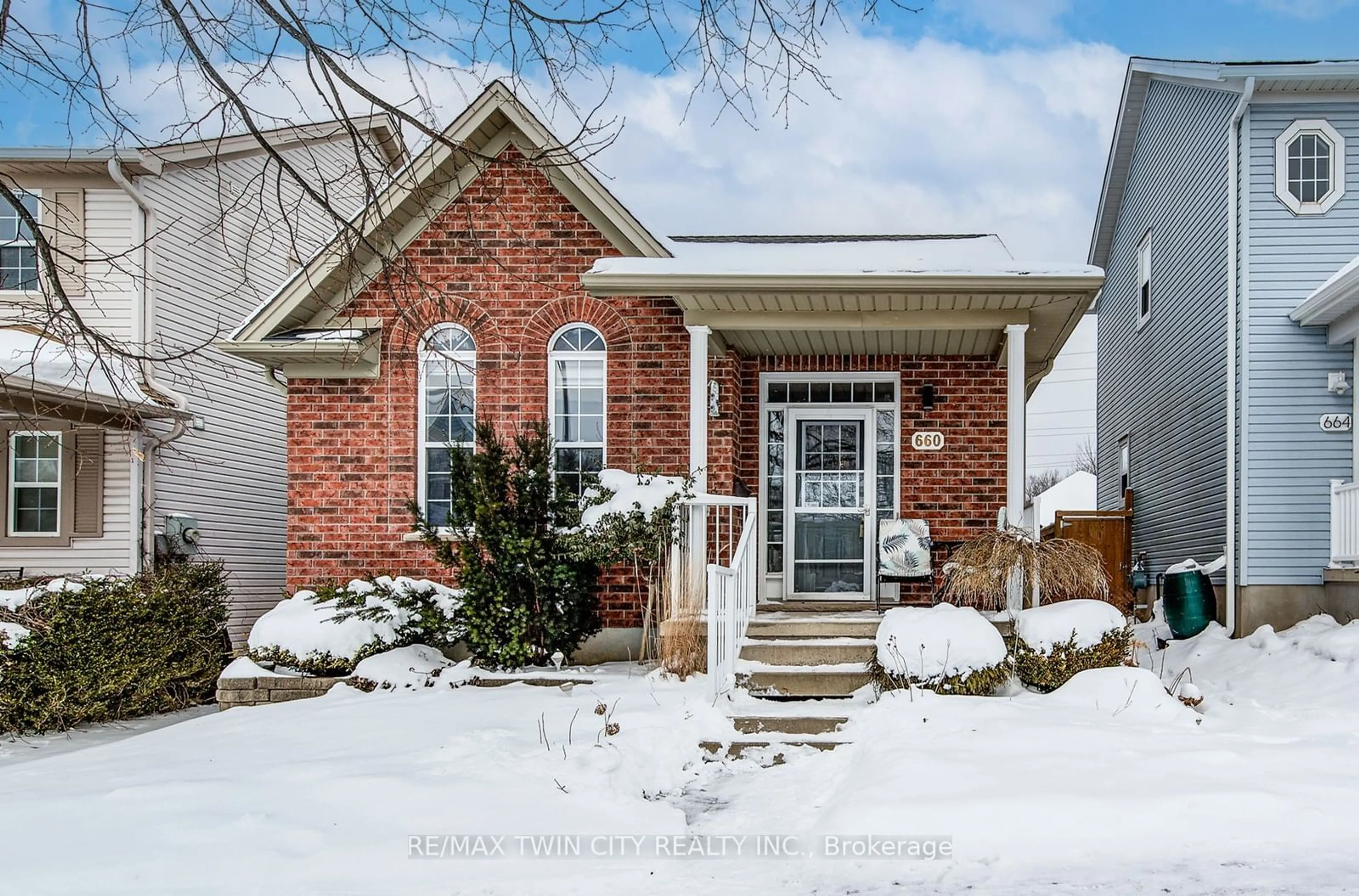 Home with brick exterior material, street for 660 Zermatt Dr, Waterloo Ontario N2T 2V2