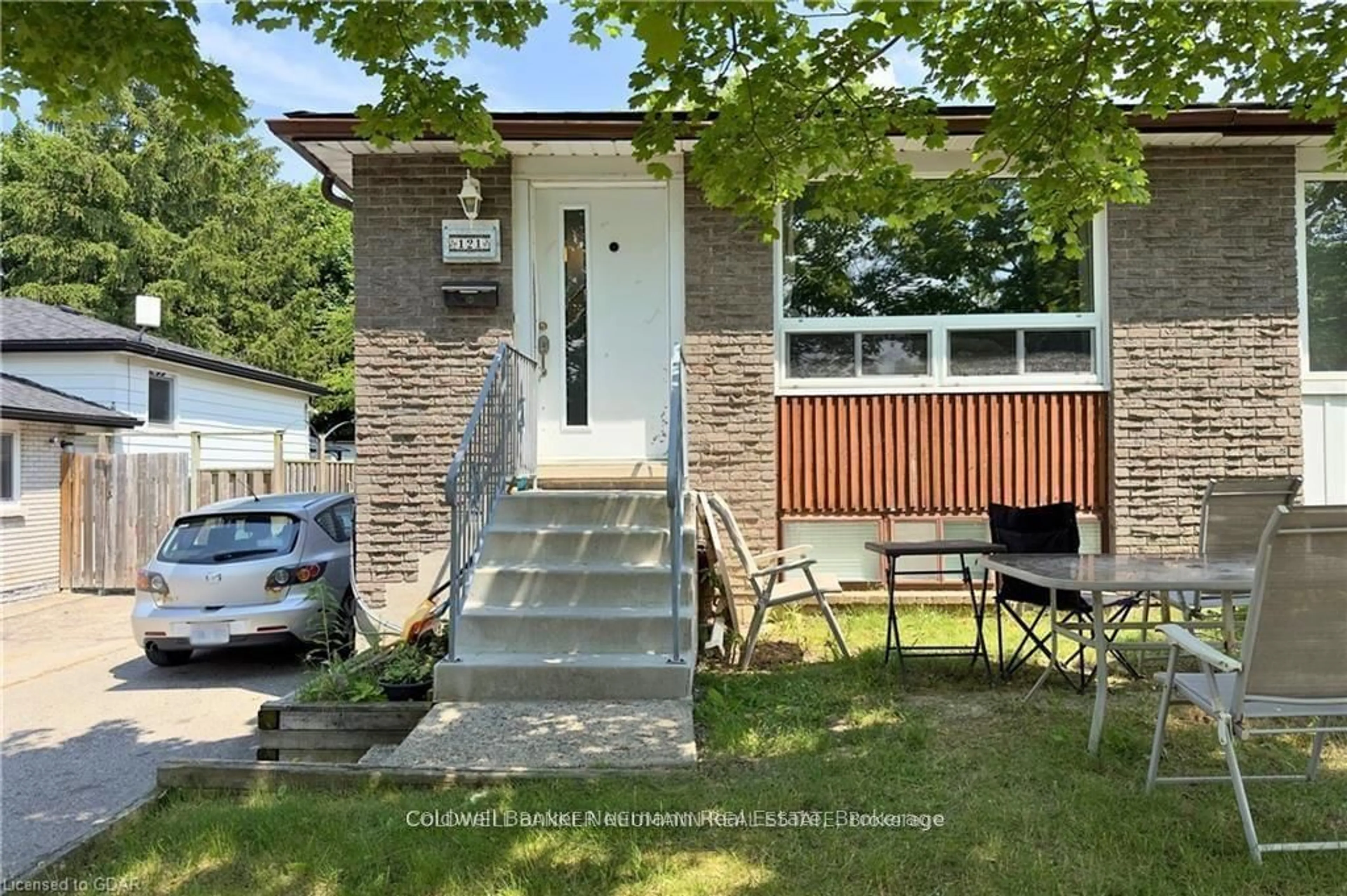 Home with brick exterior material, street for 121 CONROY Cres, Guelph Ontario N1G 2V5