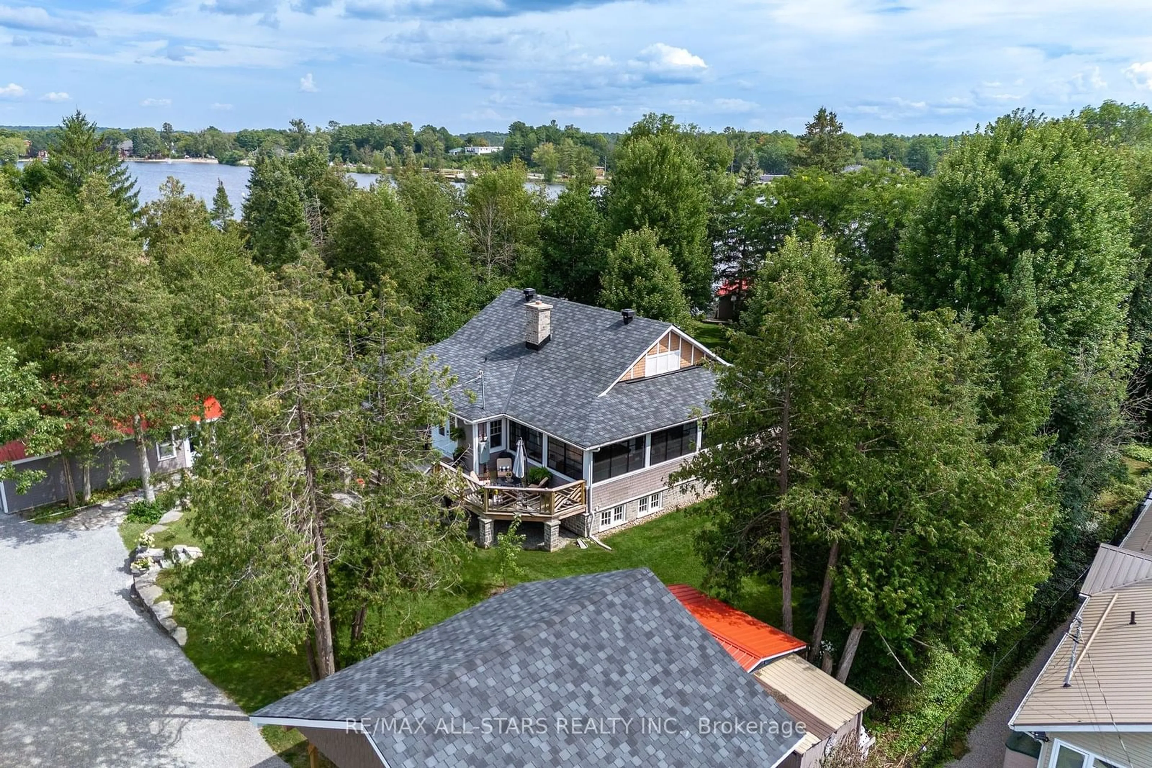 A pic from outside/outdoor area/front of a property/back of a property/a pic from drone, water/lake/river/ocean view for 210 Front St, Kawartha Lakes Ontario K0M 1A0