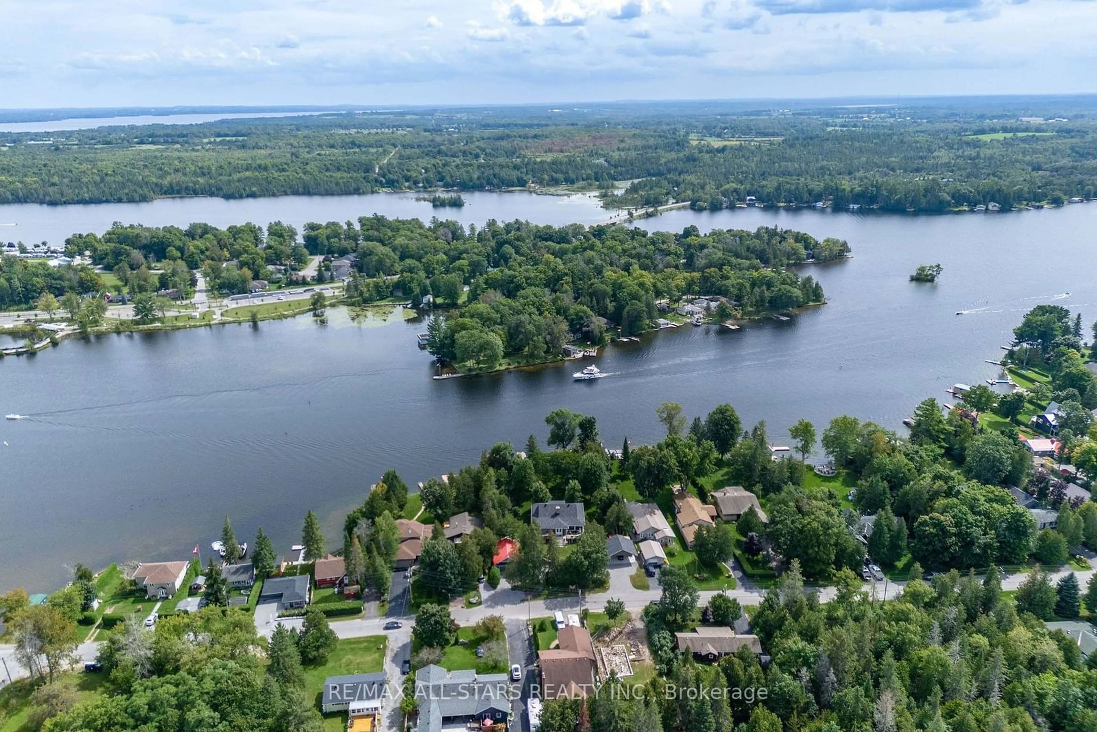 A pic from outside/outdoor area/front of a property/back of a property/a pic from drone, water/lake/river/ocean view for 210 Front St, Kawartha Lakes Ontario K0M 1A0