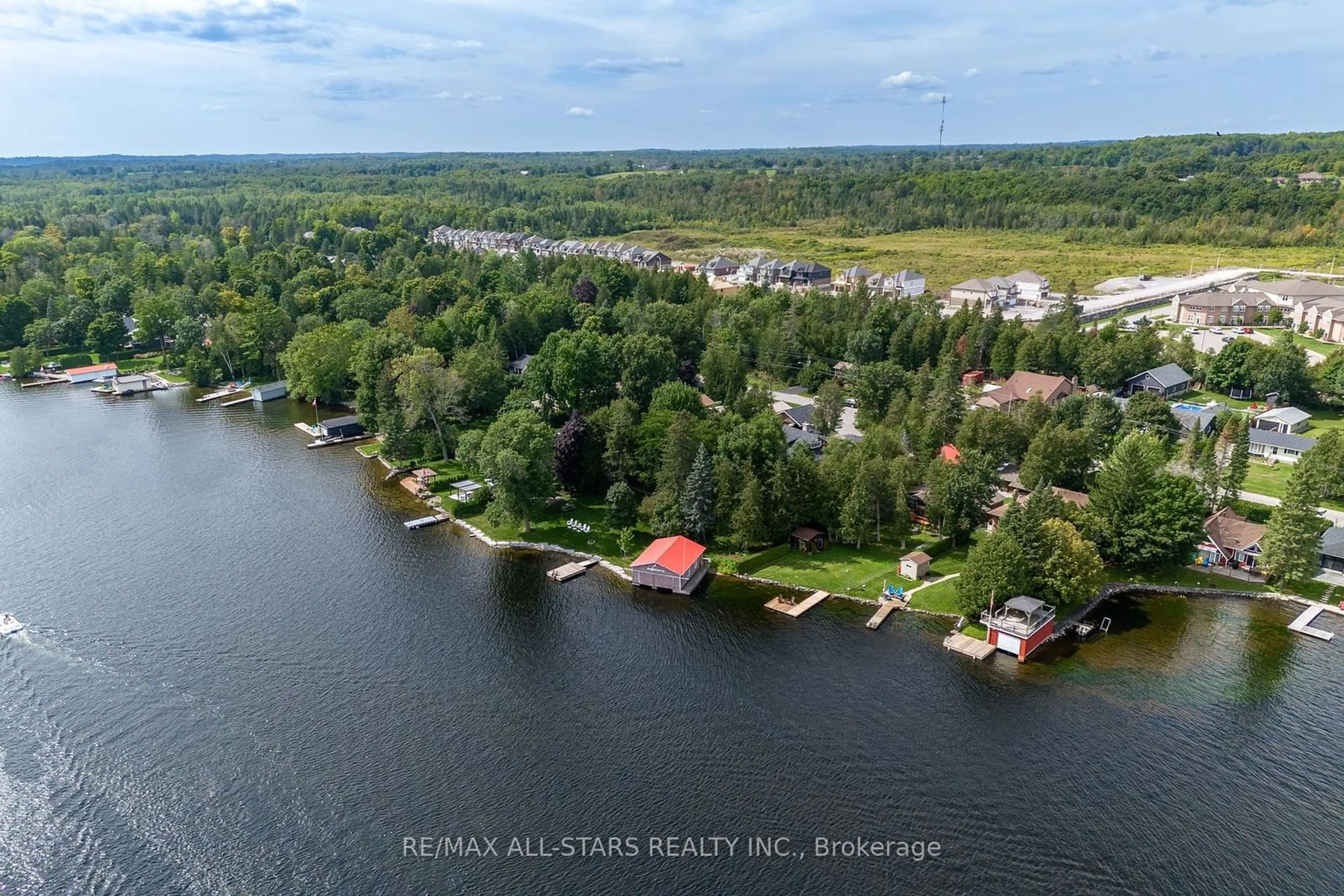 A pic from outside/outdoor area/front of a property/back of a property/a pic from drone, water/lake/river/ocean view for 210 Front St, Kawartha Lakes Ontario K0M 1A0