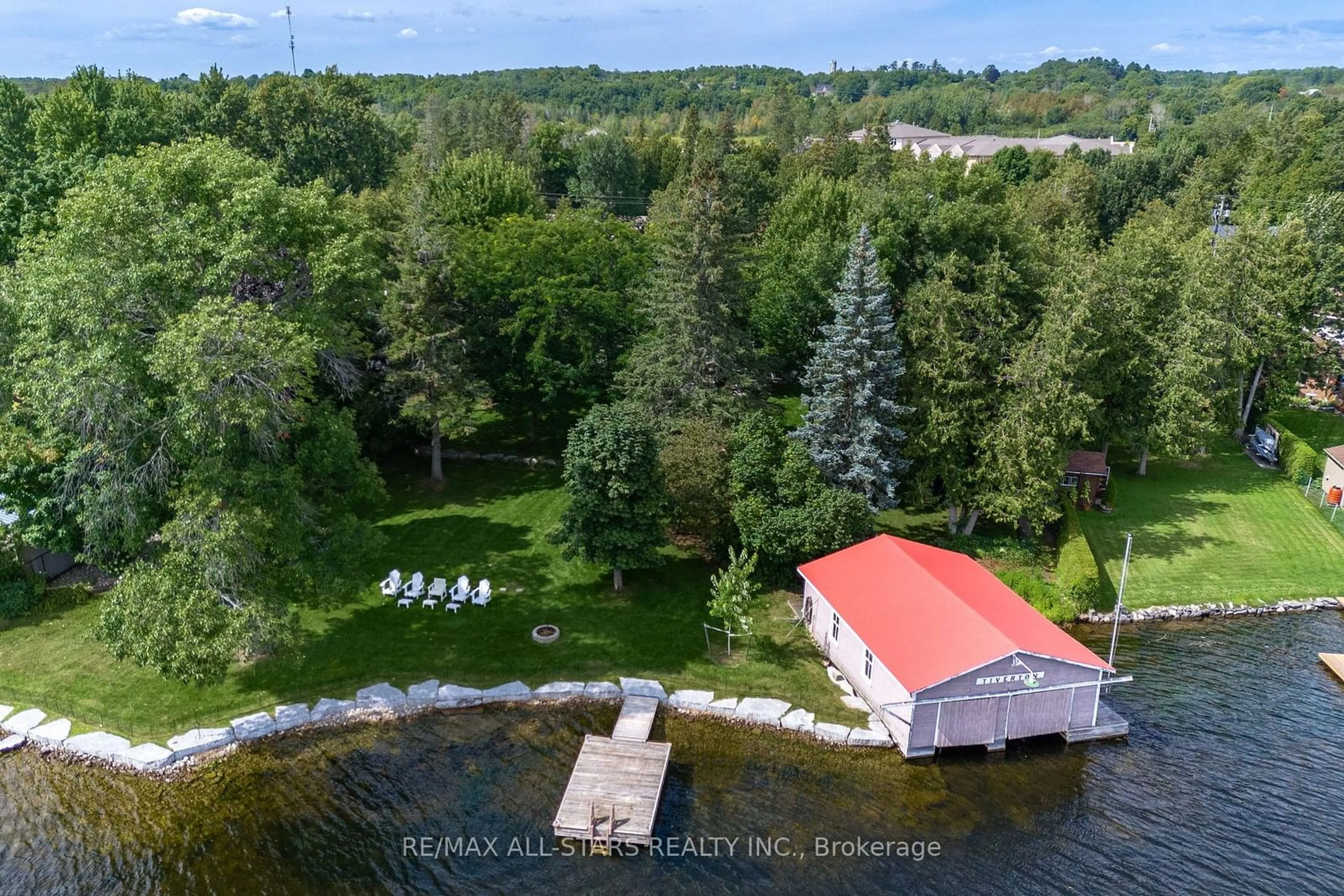 A pic from outside/outdoor area/front of a property/back of a property/a pic from drone, water/lake/river/ocean view for 210 Front St, Kawartha Lakes Ontario K0M 1A0