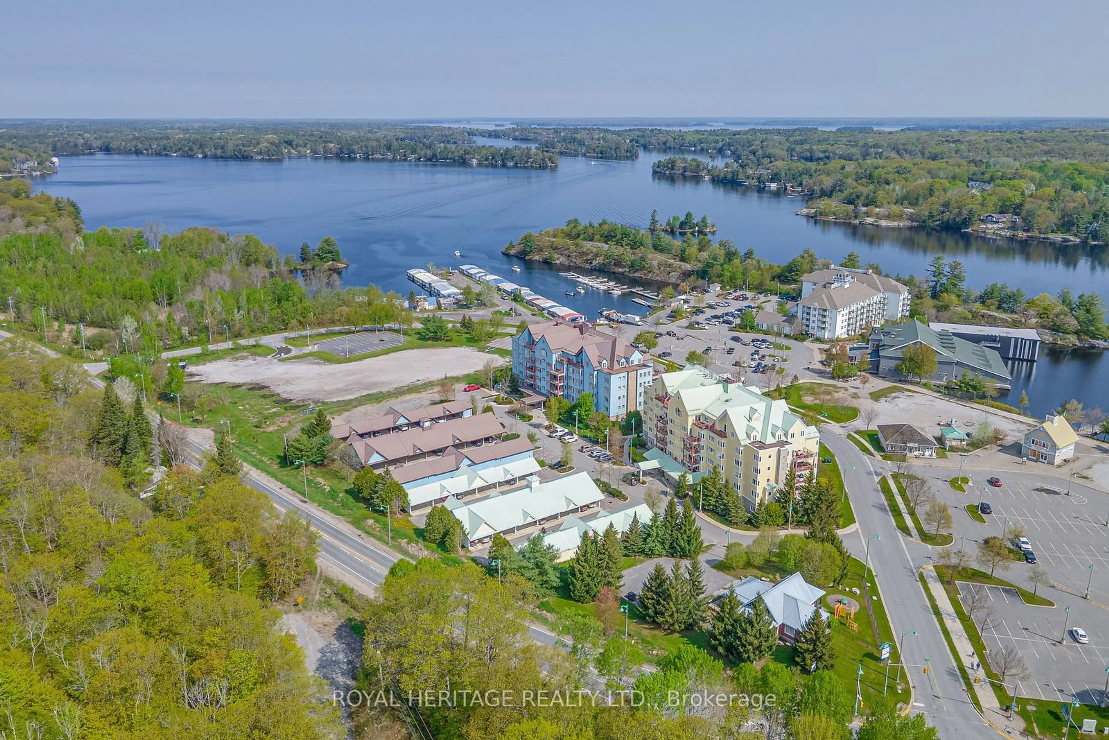 A pic from outside/outdoor area/front of a property/back of a property/a pic from drone, water/lake/river/ocean view for 130 Steamship Bay Rd #605, Gravenhurst Ontario P0C 1G0