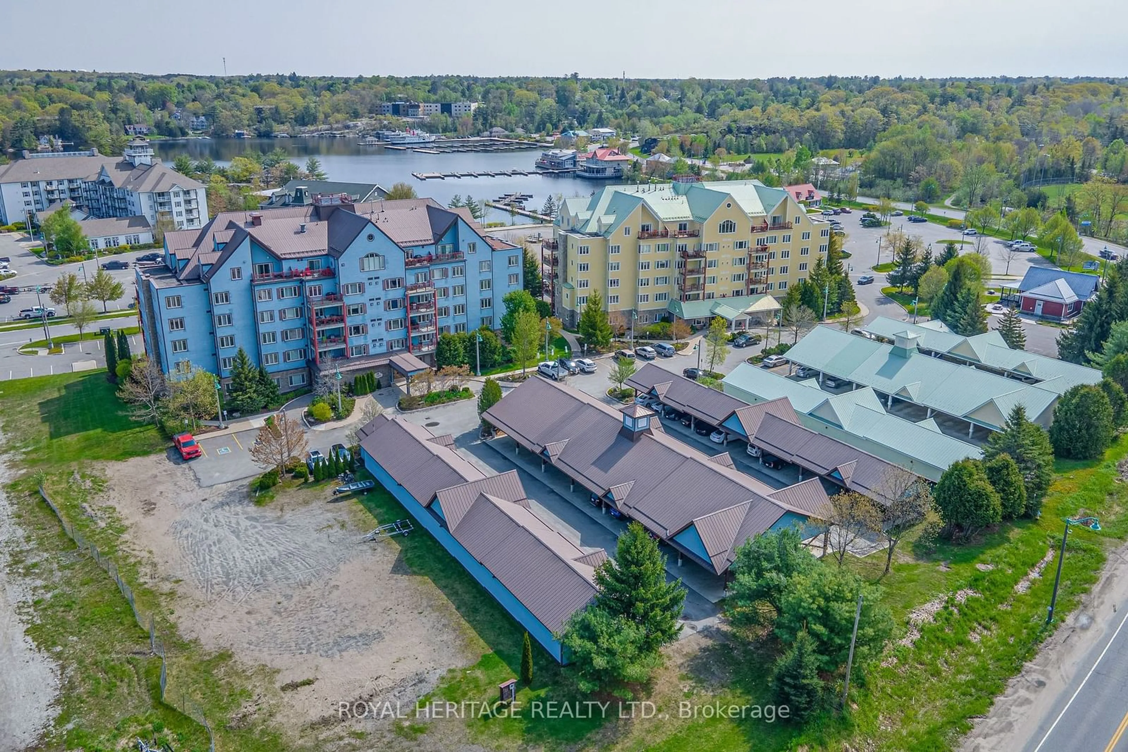 A pic from outside/outdoor area/front of a property/back of a property/a pic from drone, unknown for 130 Steamship Bay Rd #605, Gravenhurst Ontario P0C 1G0