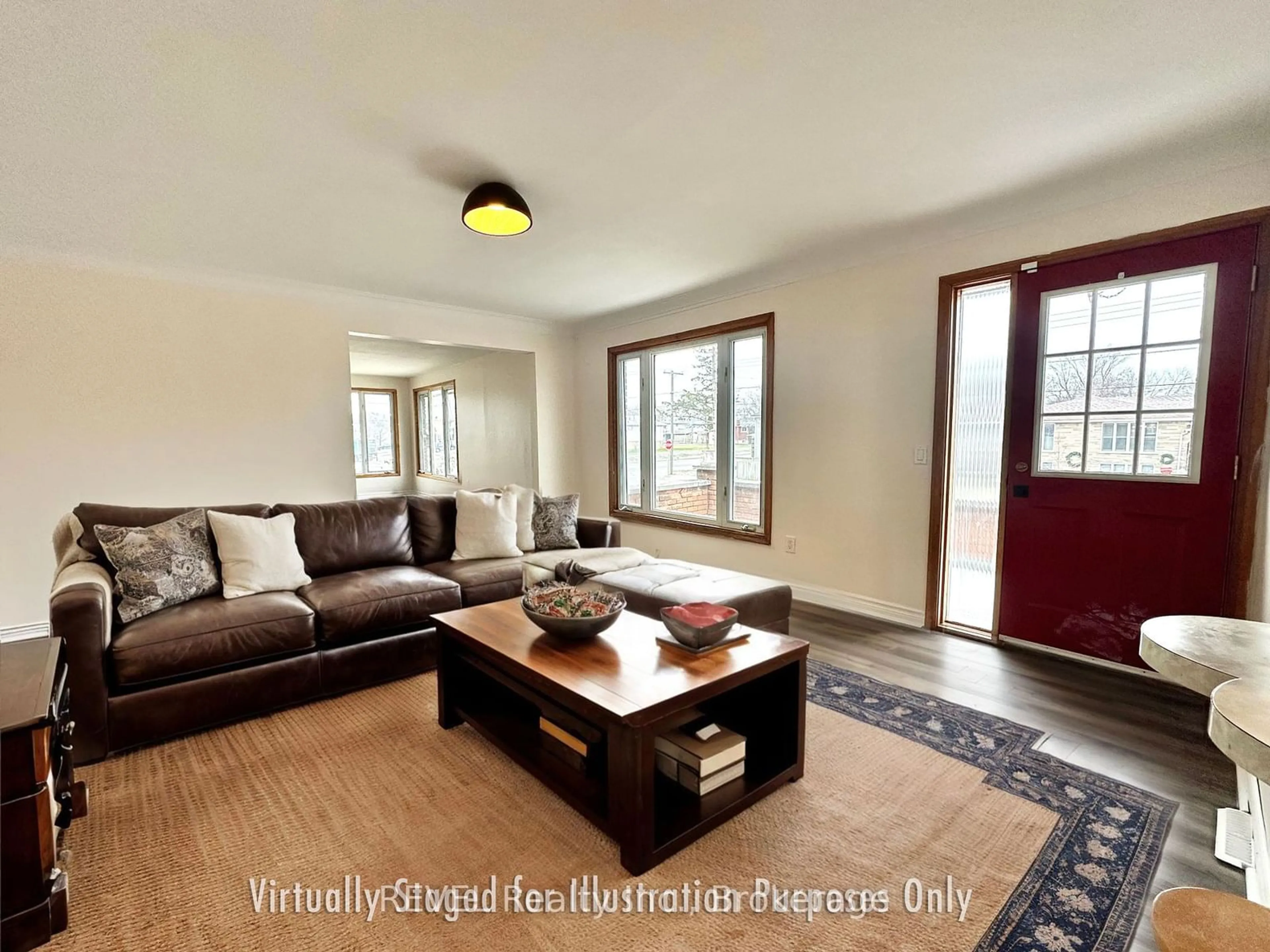 Living room with furniture, wood/laminate floor for 114 Catherine St, Fort Erie Ontario L2A 2H6