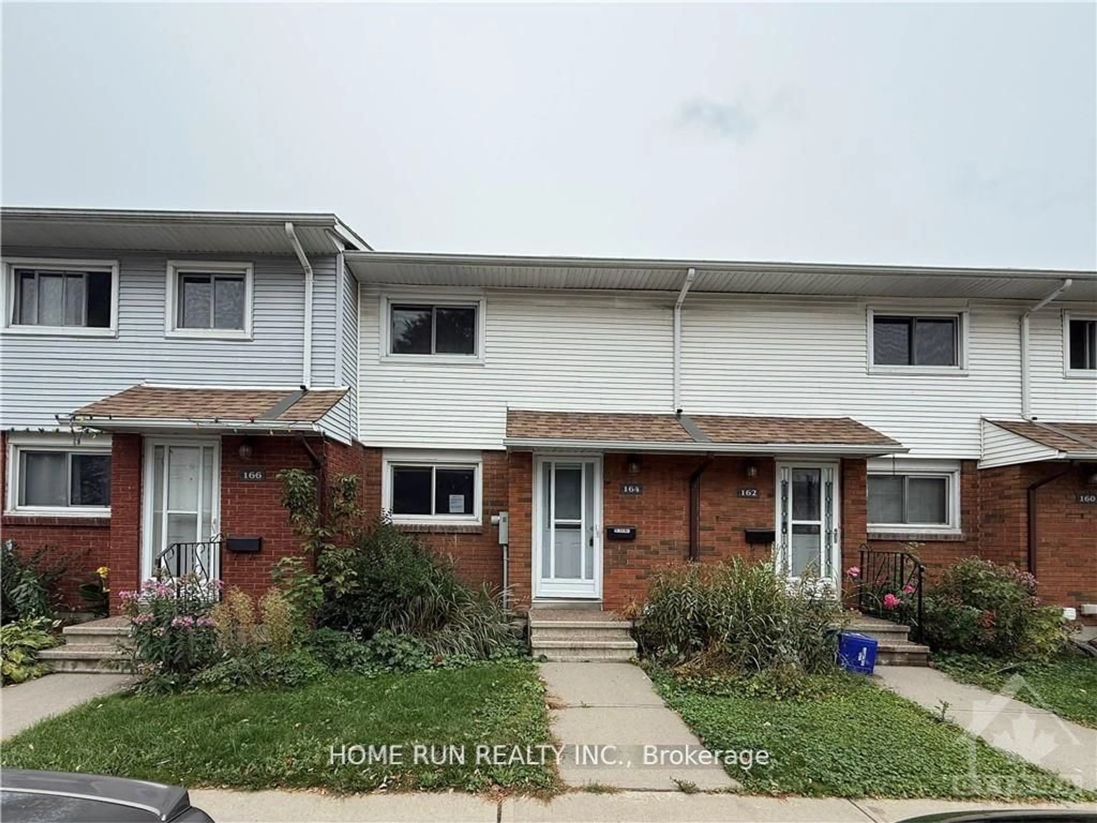 A pic from outside/outdoor area/front of a property/back of a property/a pic from drone, street for 1045 MORRISON Dr #164, Parkway Park - Queensway Terrace S and Area Ontario K2H 7L2