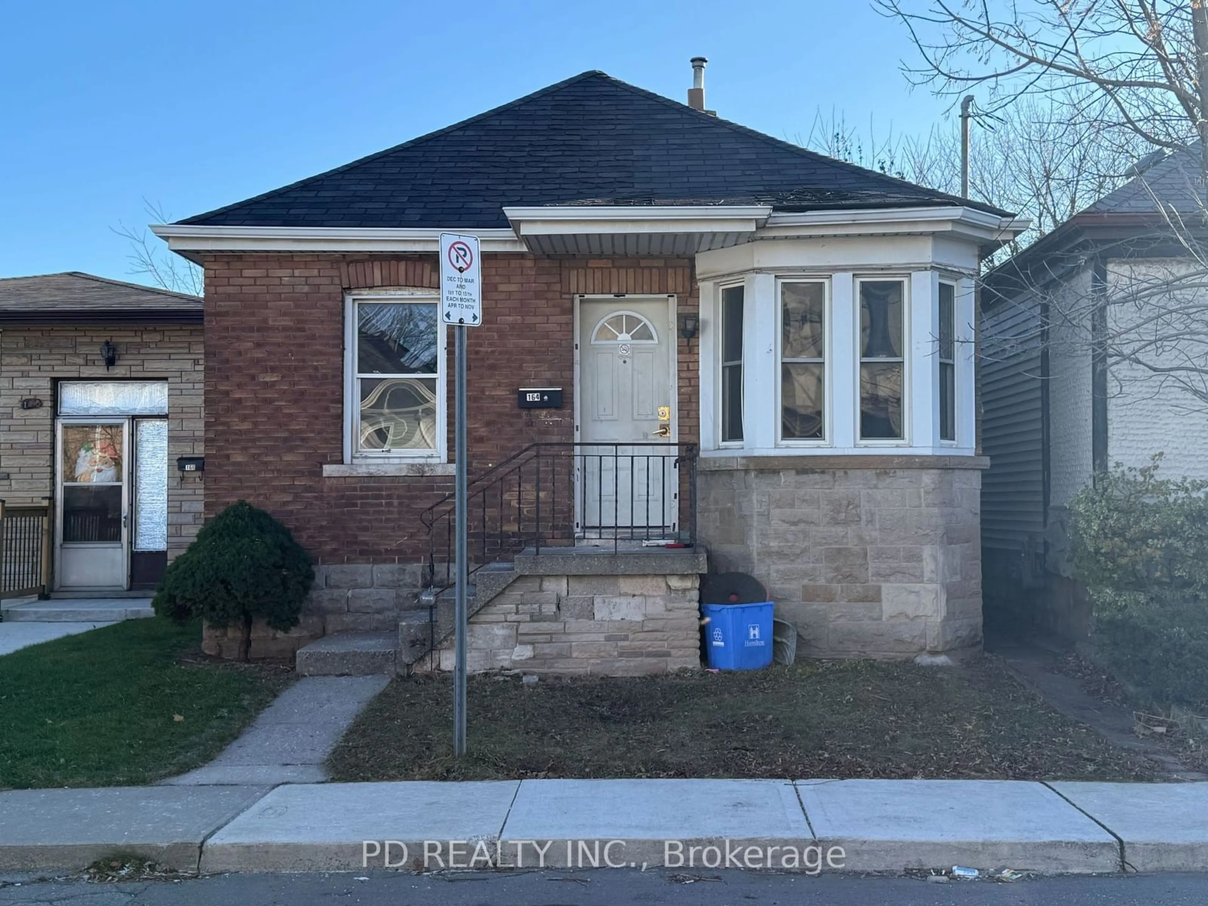 Home with brick exterior material, street for 164 London St, Hamilton Ontario L8H 4B8