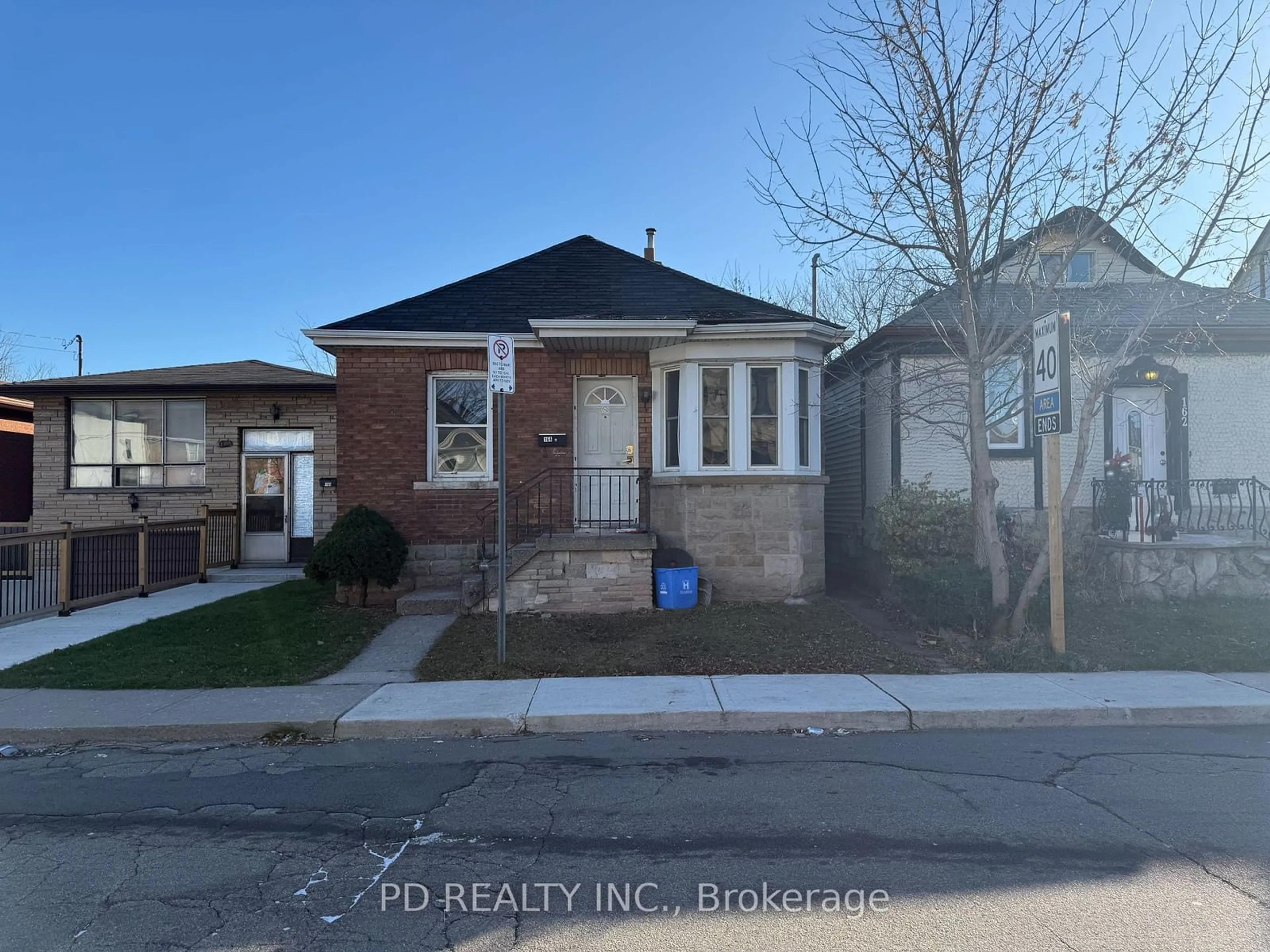 Home with brick exterior material, street for 164 London St, Hamilton Ontario L8H 4B8