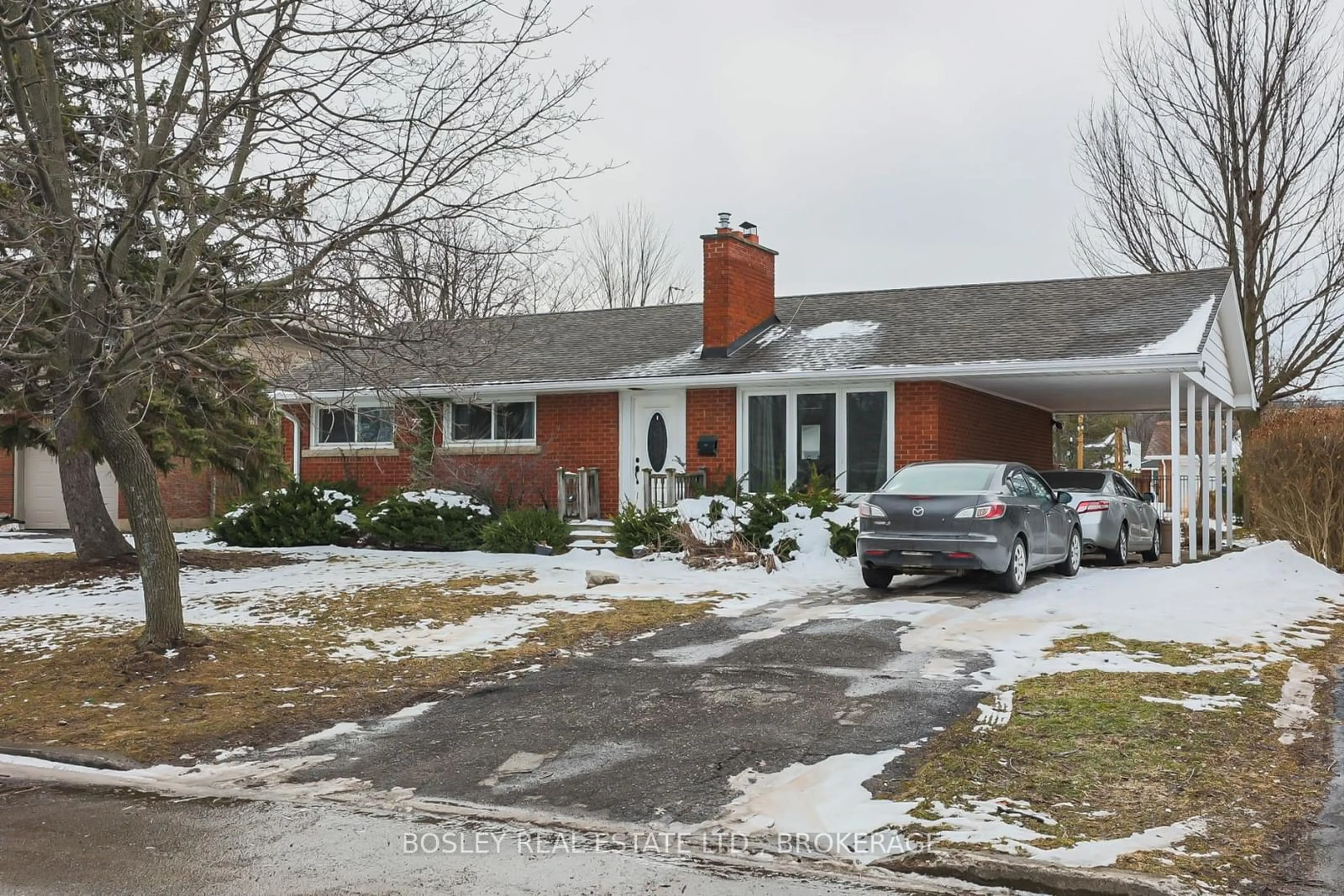 Home with brick exterior material, street for 16 Strathmore Rd, St. Catharines Ontario L2T 2C5