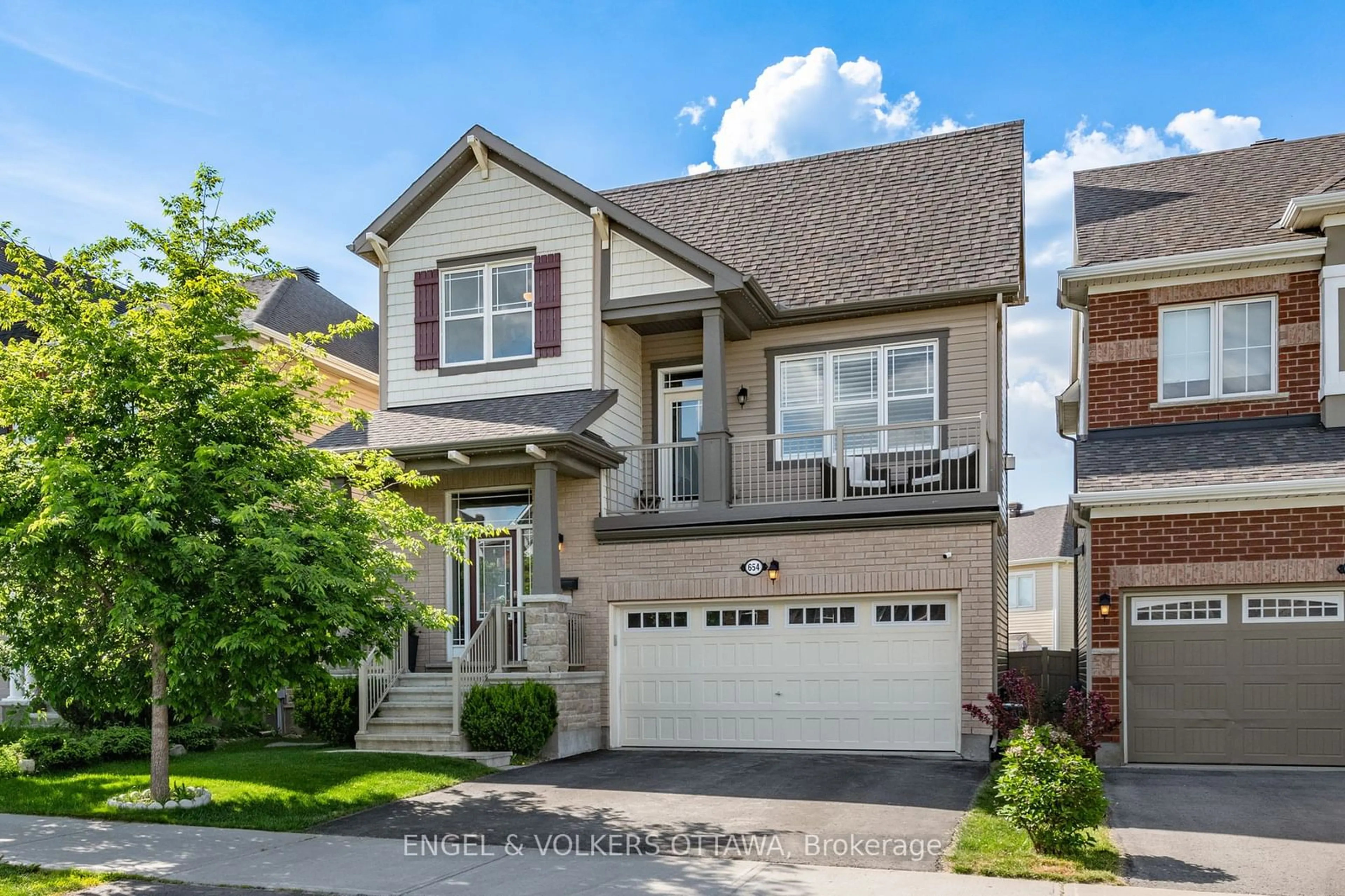 Home with brick exterior material, street for 654 Dundonald Dr, Barrhaven Ontario K2J 6C6