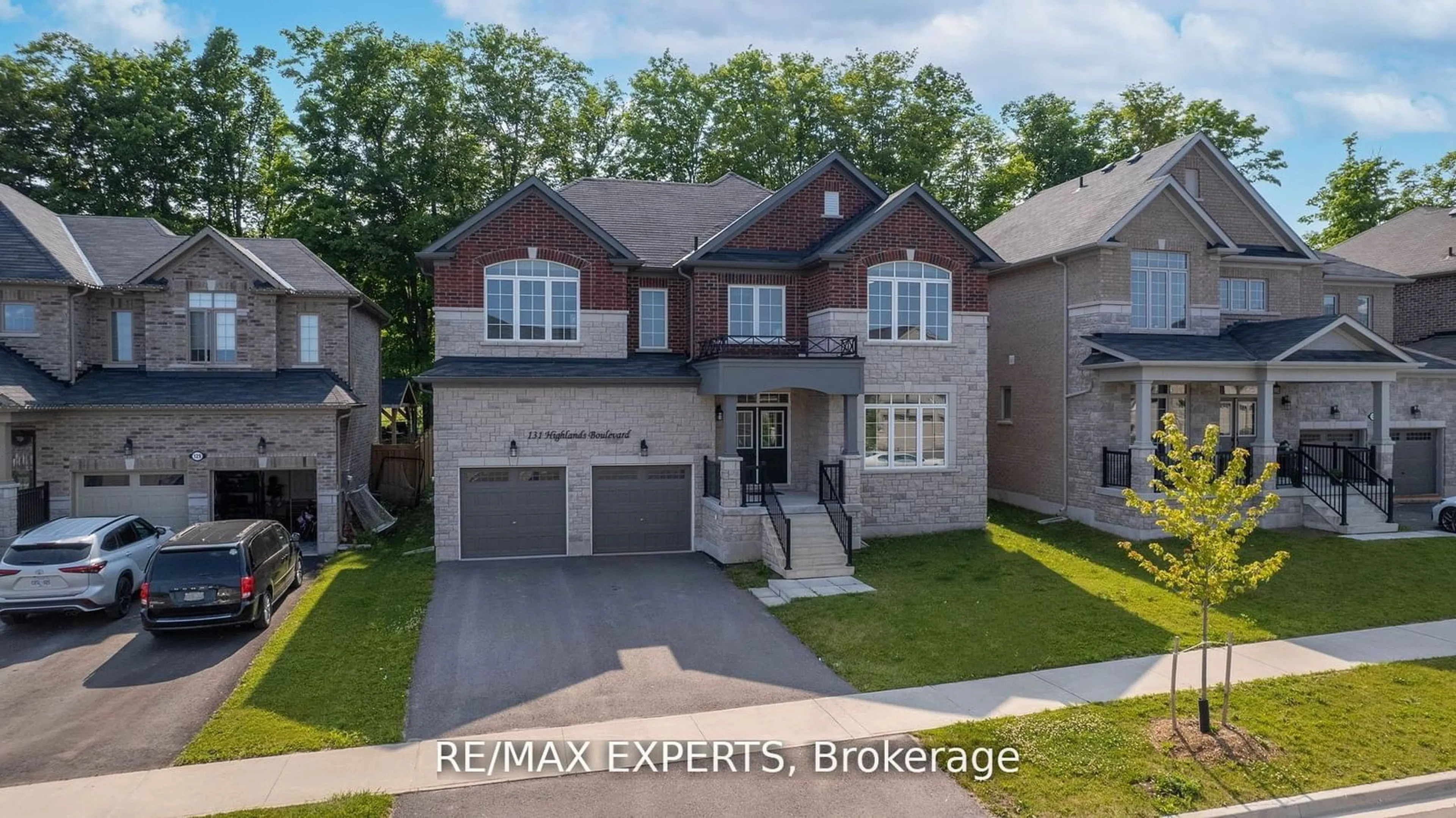 Home with brick exterior material, street for 131 Highlands Blvd, Cavan Monaghan Ontario L0A 1G0