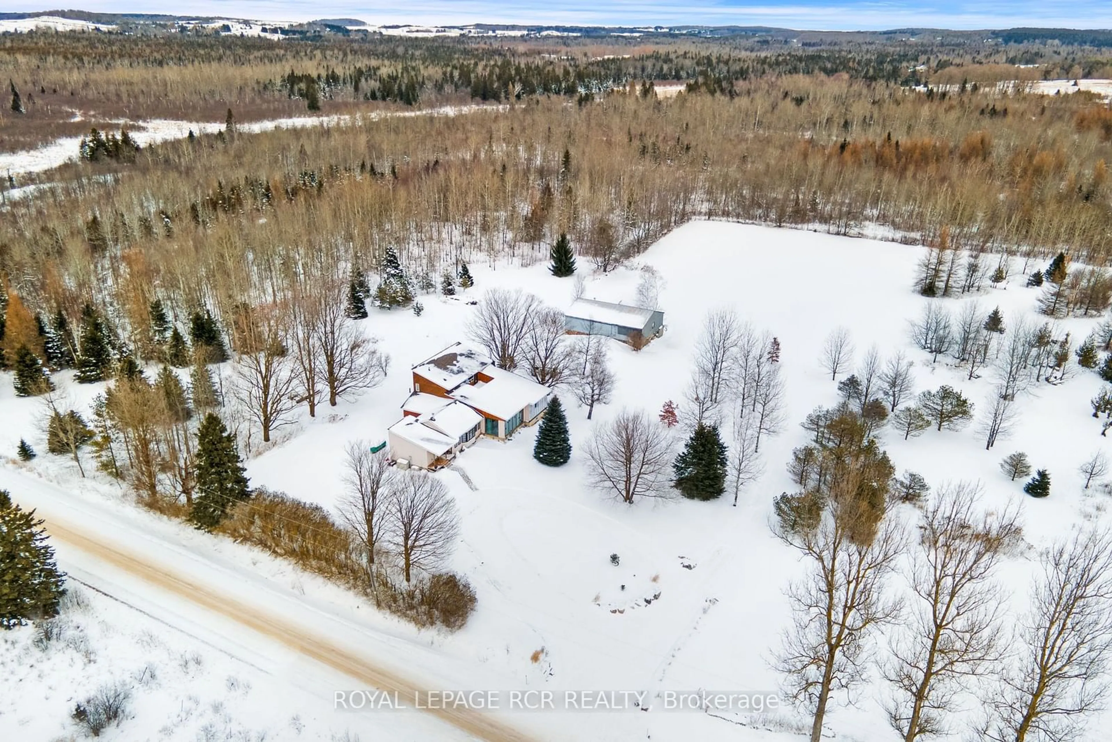 A pic from outside/outdoor area/front of a property/back of a property/a pic from drone, forest/trees view for 595133 Blind Line, Mono Ontario L9W 5N4