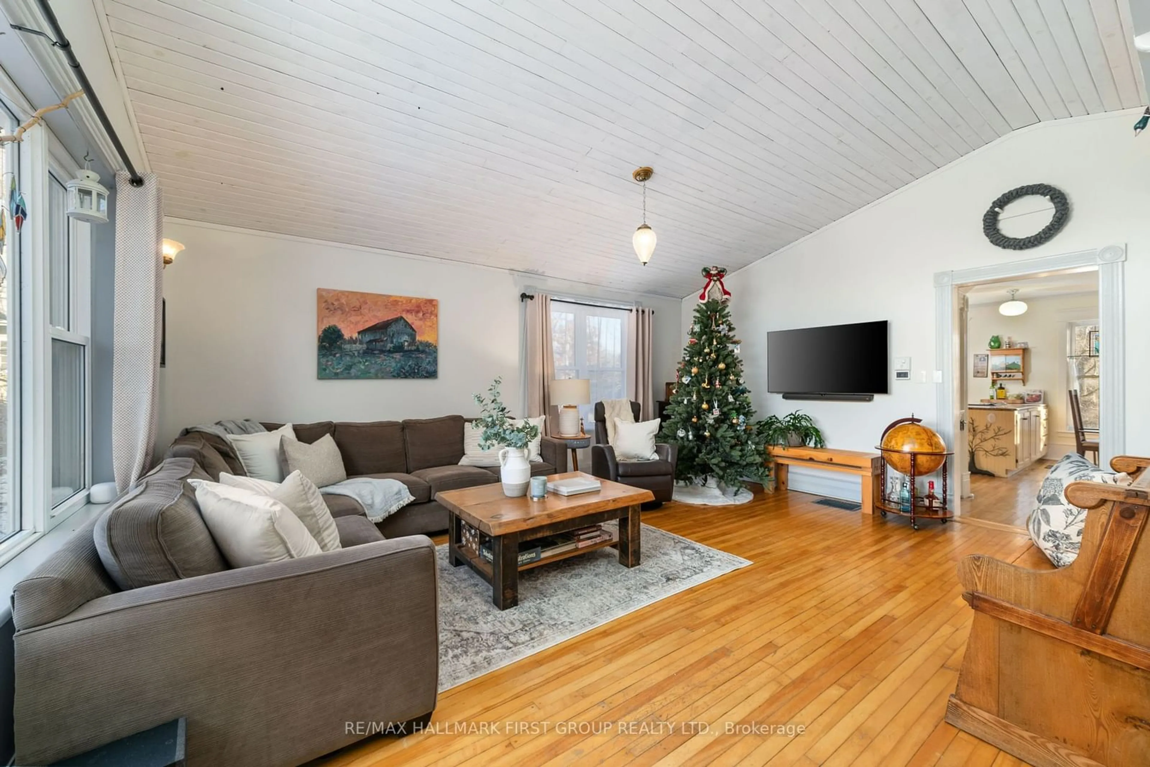 Living room with furniture, wood/laminate floor for 16882 Telephone Rd, Quinte West Ontario K8V 5P4