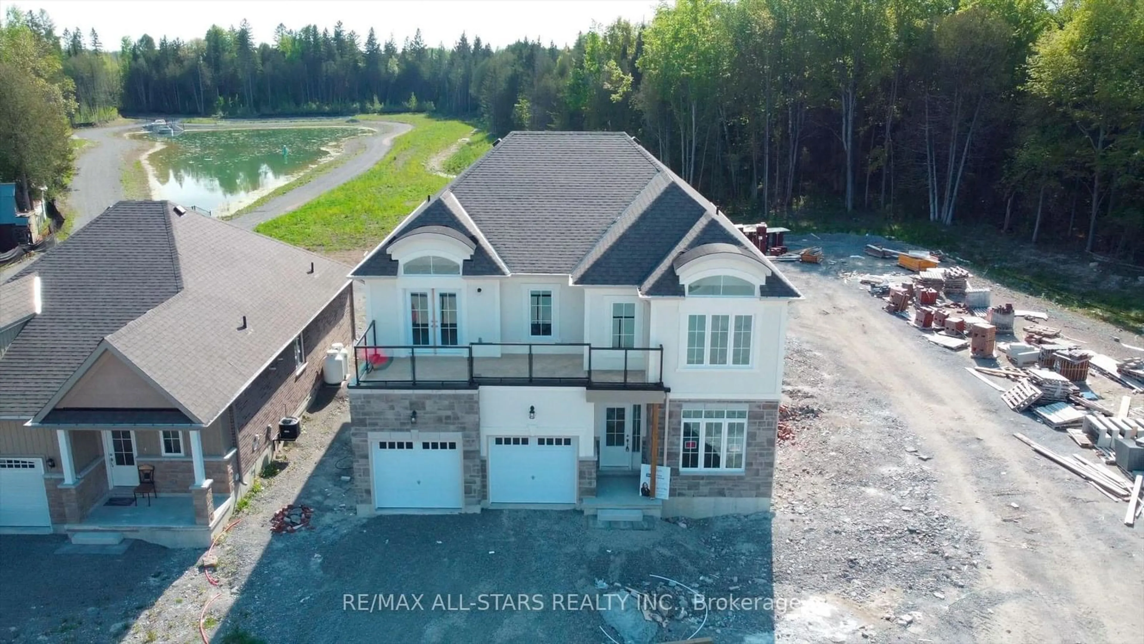 A pic from outside/outdoor area/front of a property/back of a property/a pic from drone, water/lake/river/ocean view for 13 Spruceside Dr, Kawartha Lakes Ontario K0M 1A0