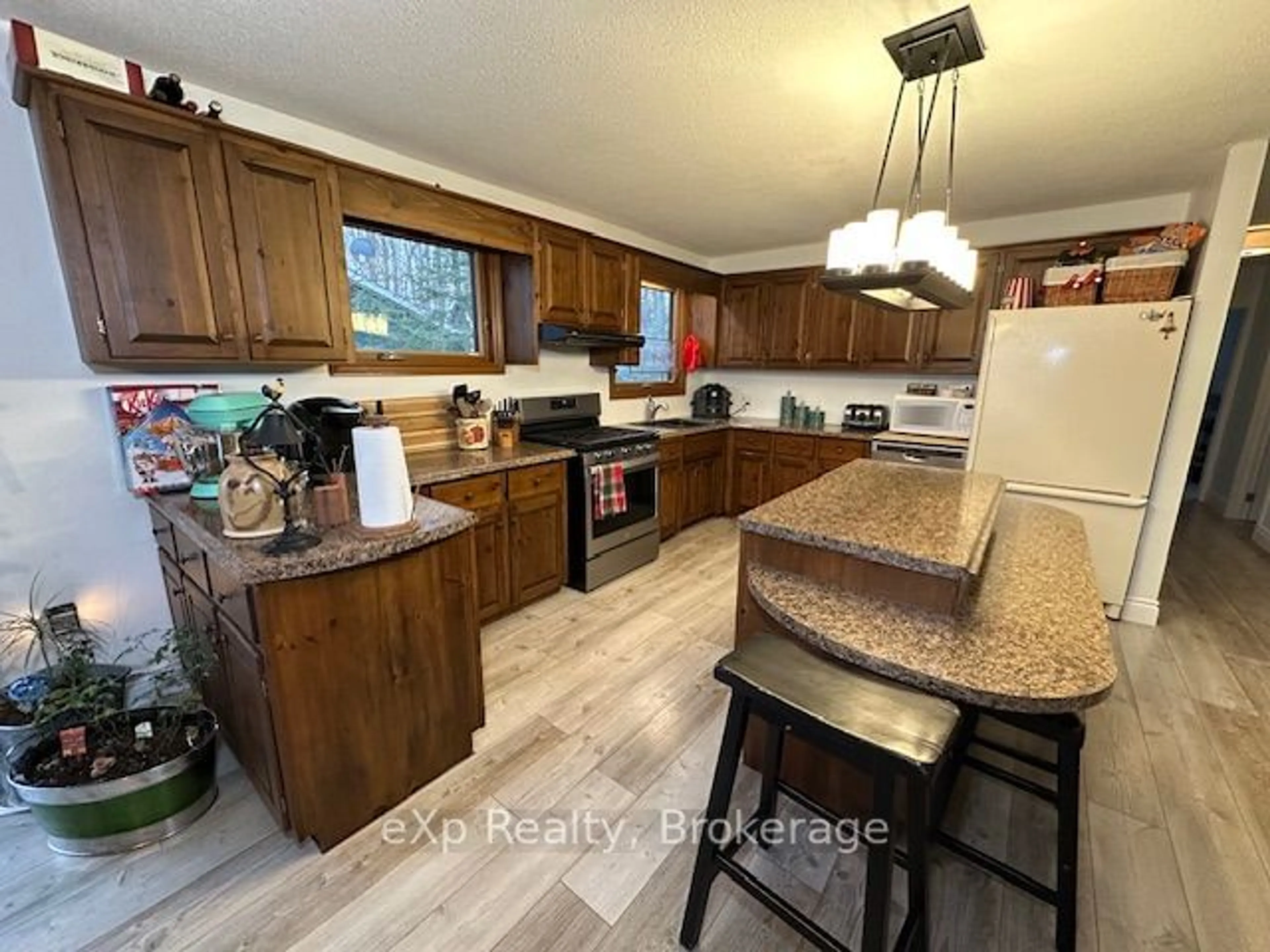 Open concept kitchen, wood/laminate floor for 103 Fedy Dr, South Bruce Peninsula Ontario N0H 2G0