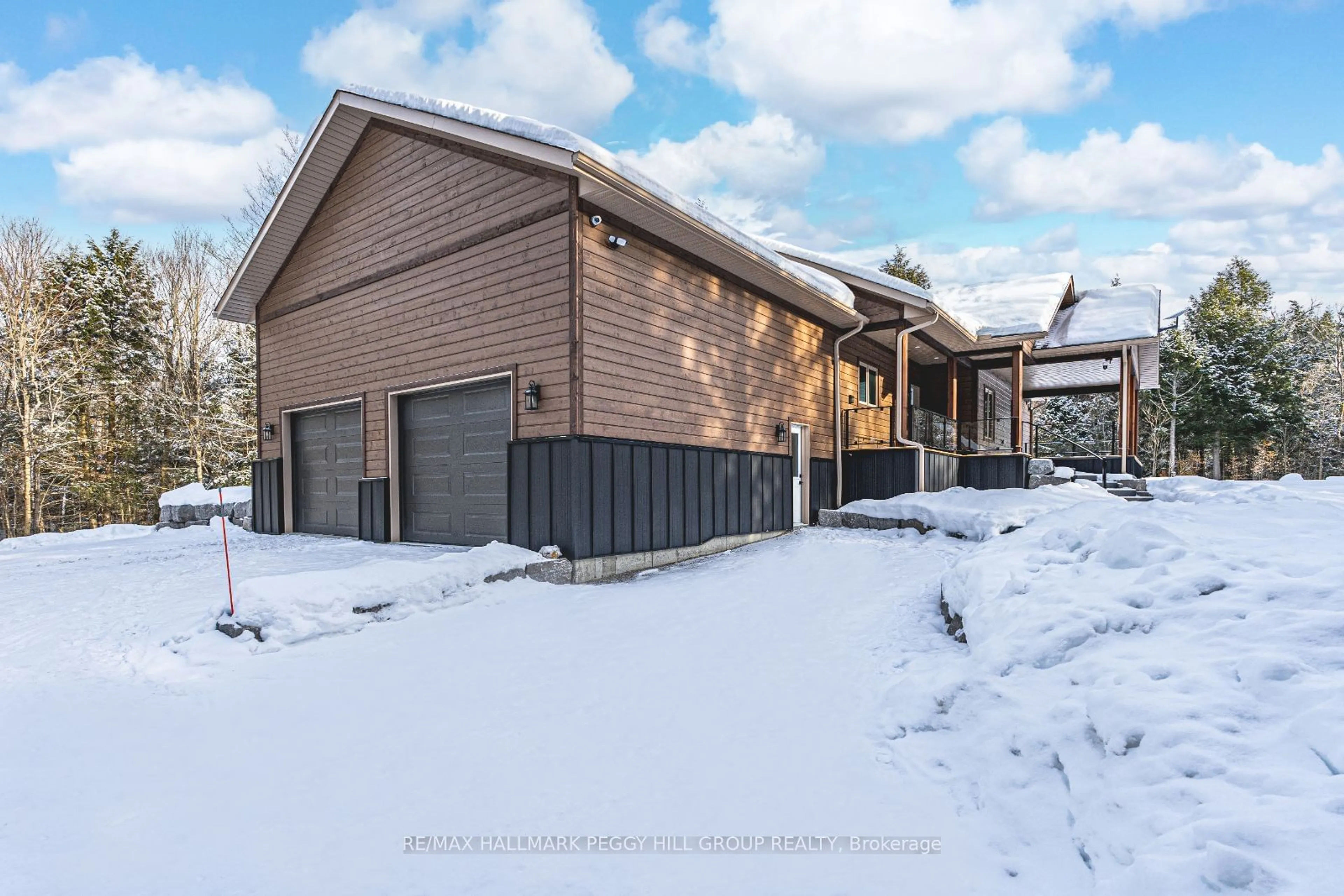 A pic from outside/outdoor area/front of a property/back of a property/a pic from drone, street for 4571 Aspdin Rd, Muskoka Lakes Ontario P0B 1M0