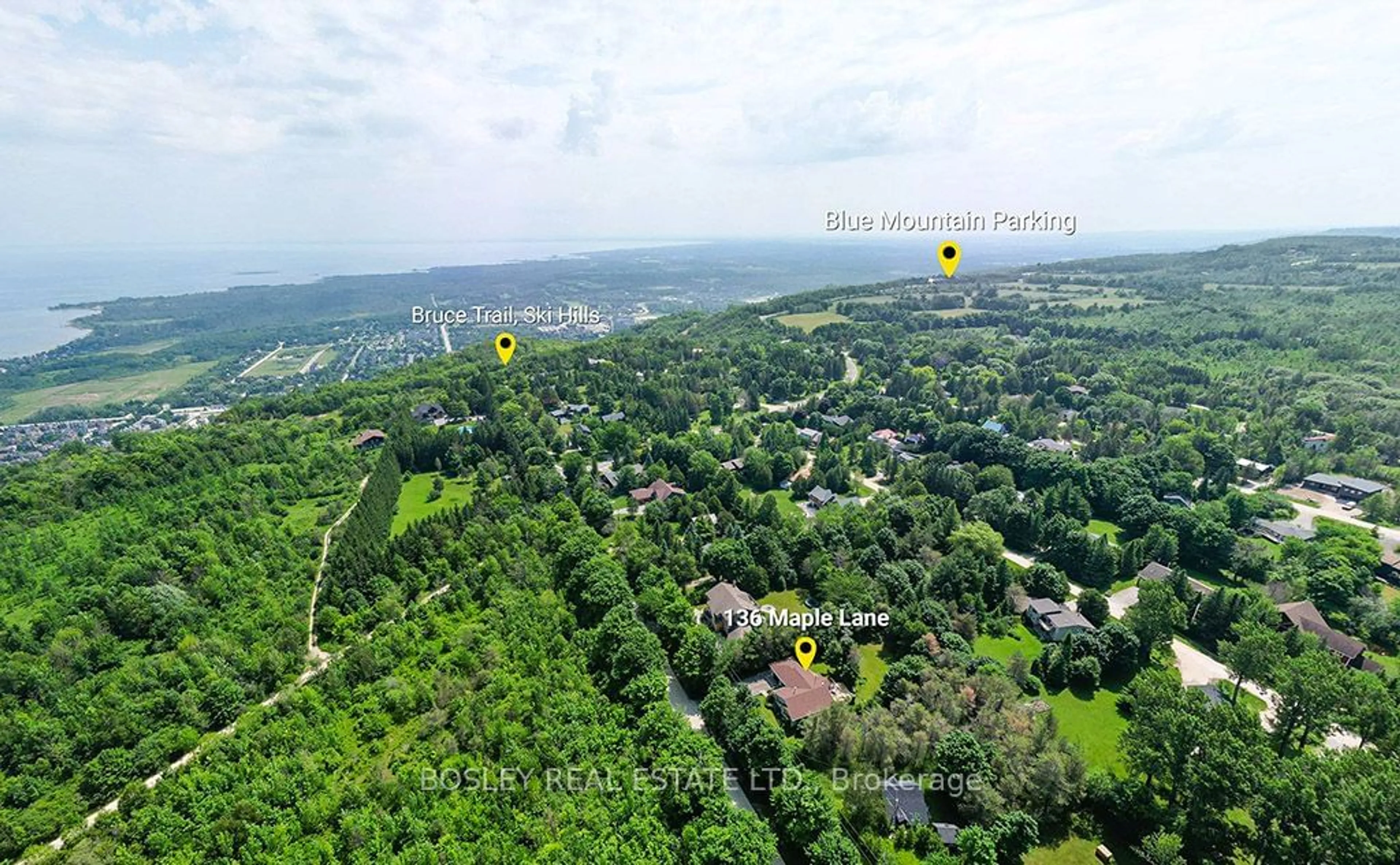 A pic from outside/outdoor area/front of a property/back of a property/a pic from drone, forest/trees view for 136 Maple Lane, Blue Mountains Ontario N0H 2E0