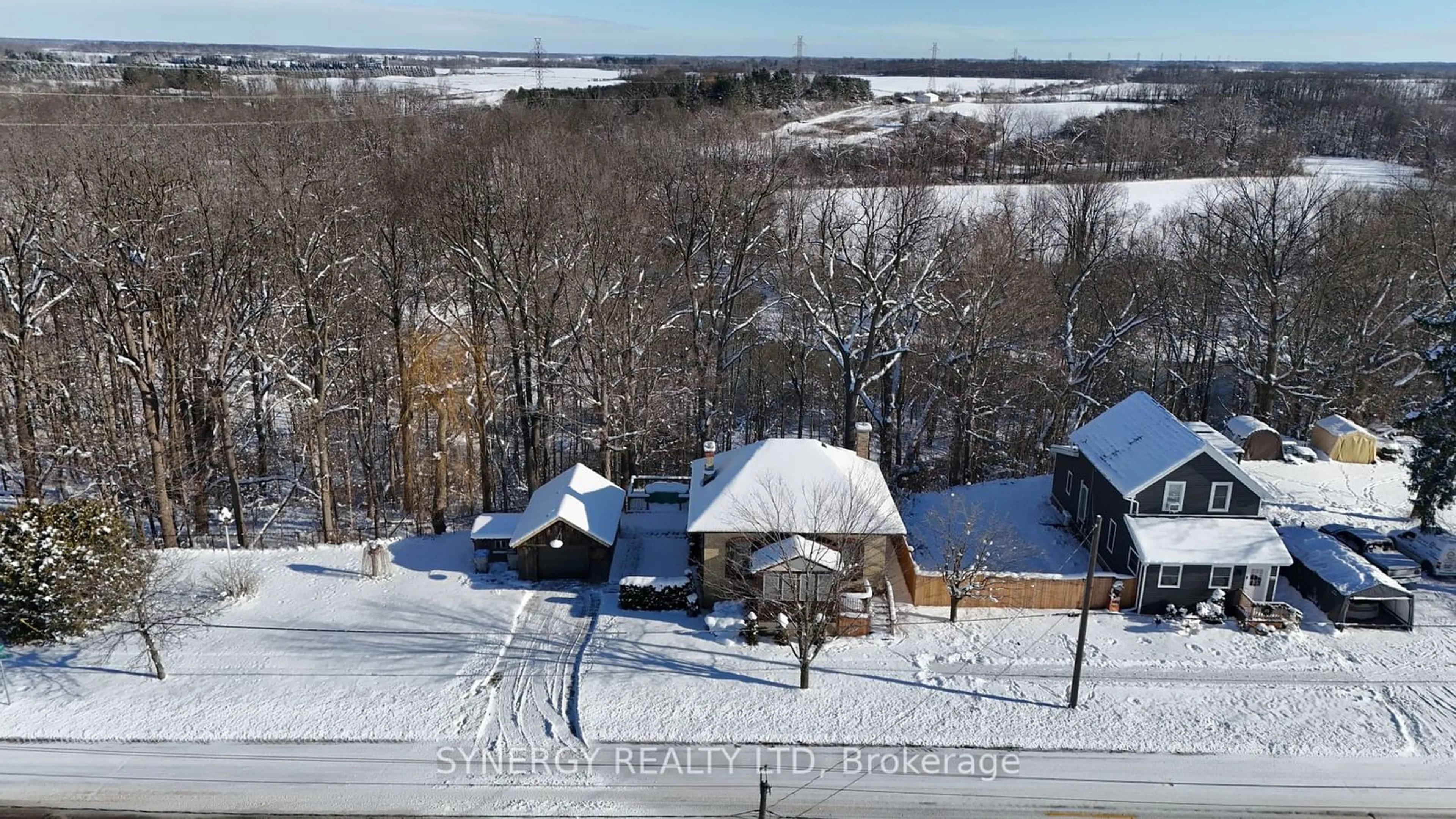 A pic from outside/outdoor area/front of a property/back of a property/a pic from drone, unknown for 3164 River St, Brooke-Alvinston Ontario N0N 1A0