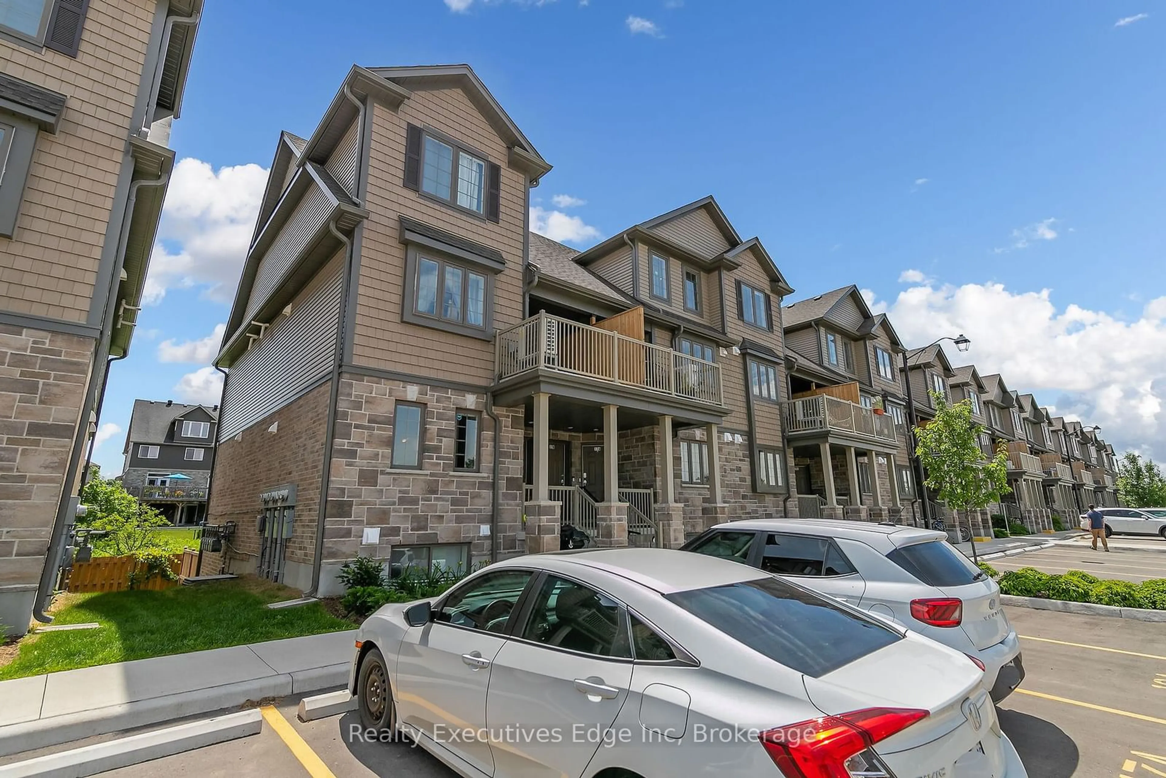 A pic from outside/outdoor area/front of a property/back of a property/a pic from drone, unknown for 85 MULLIN Dr #18B, Guelph Ontario N1E 7M2