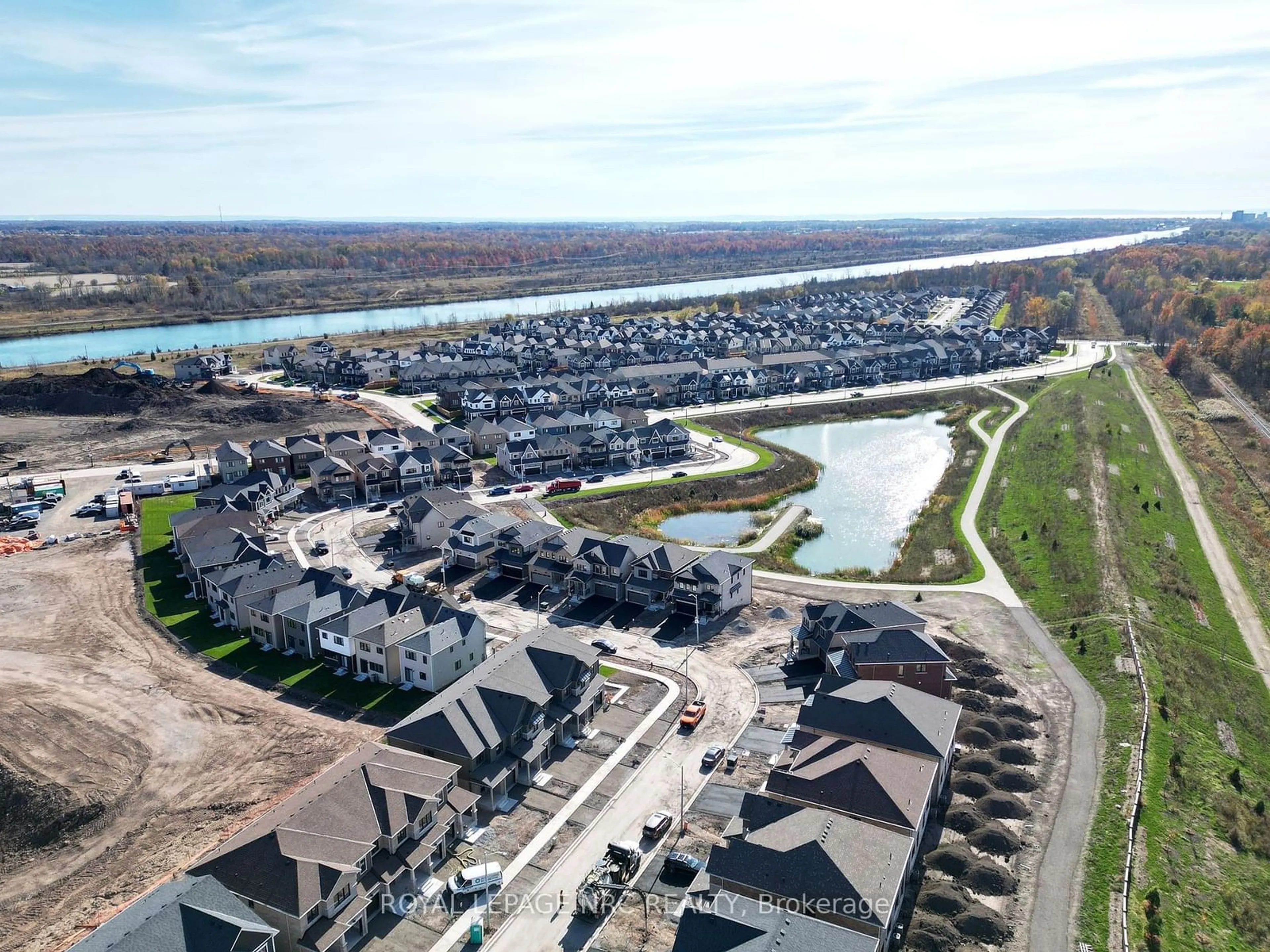 A pic from outside/outdoor area/front of a property/back of a property/a pic from drone, water/lake/river/ocean view for 219 PORT Cres, Welland Ontario L3B 0N2