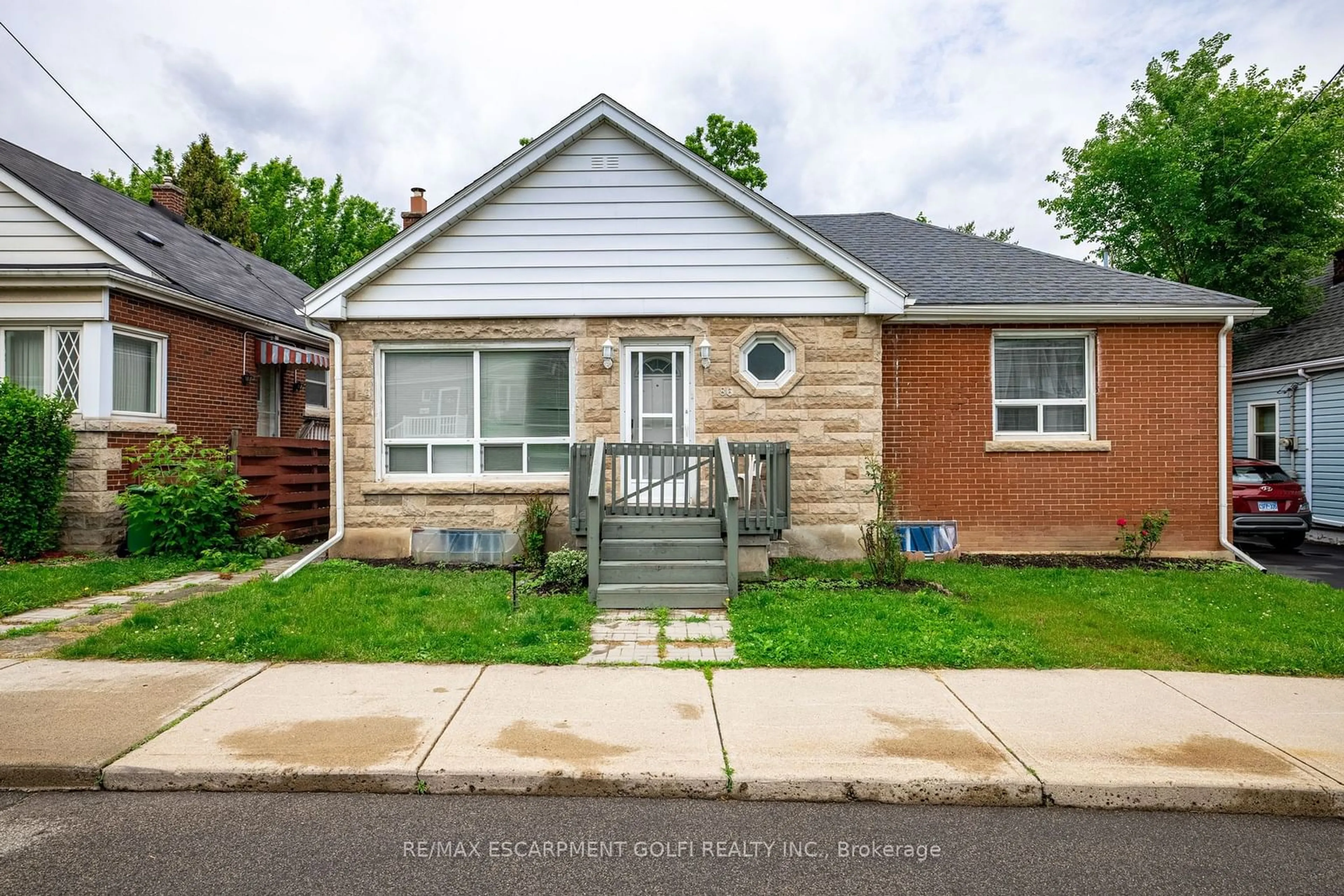 Home with brick exterior material, street for 86 Whitney Ave, Hamilton Ontario L8S 2G5