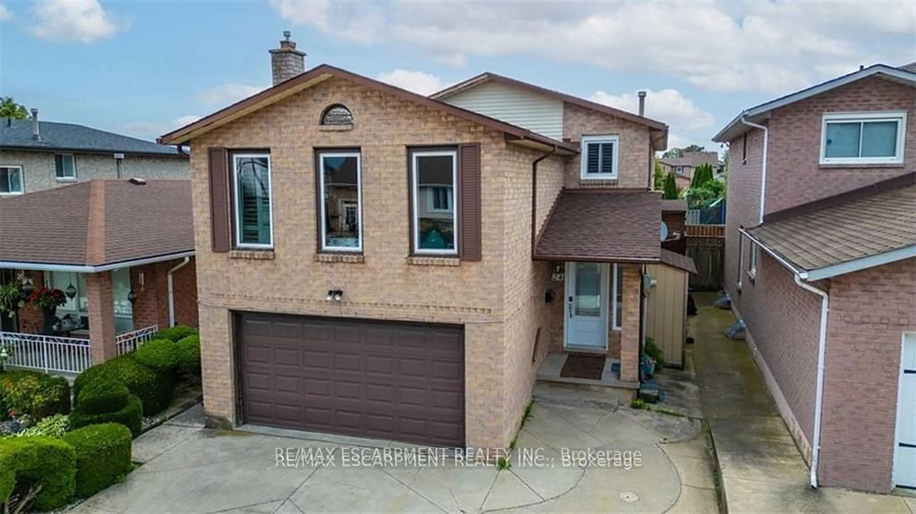 Home with brick exterior material, street for 24 Spartan Ave, Hamilton Ontario L8E 4M7