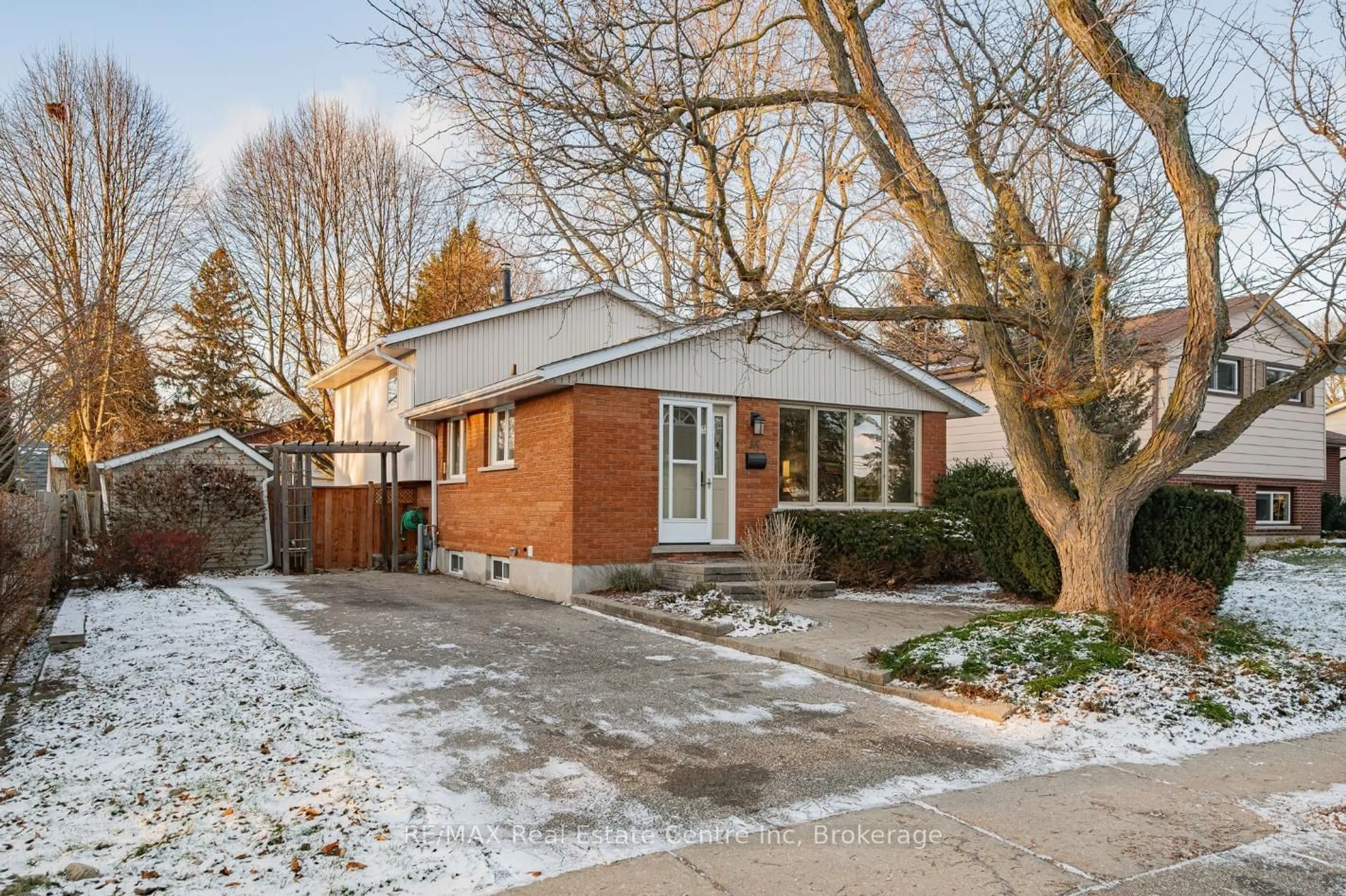 Home with brick exterior material, street for 94 GLENBURNIE Dr, Guelph Ontario N1E 4C8